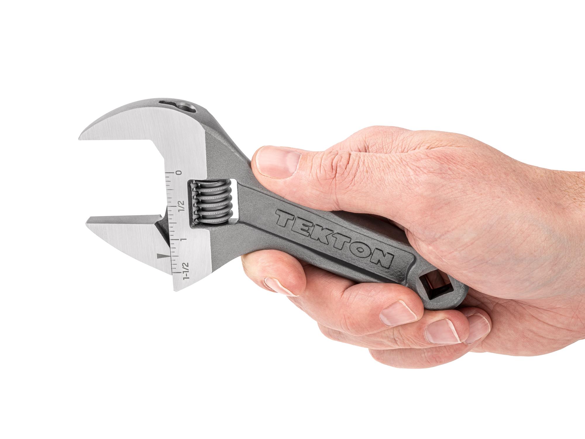 Person holding Tekton 6 inch adjustable wrench. Item #WSA04122