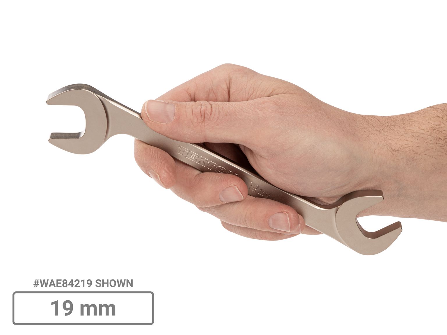 Person holding Tekton 19 millimeterangle head wrench. Item #WAE84219