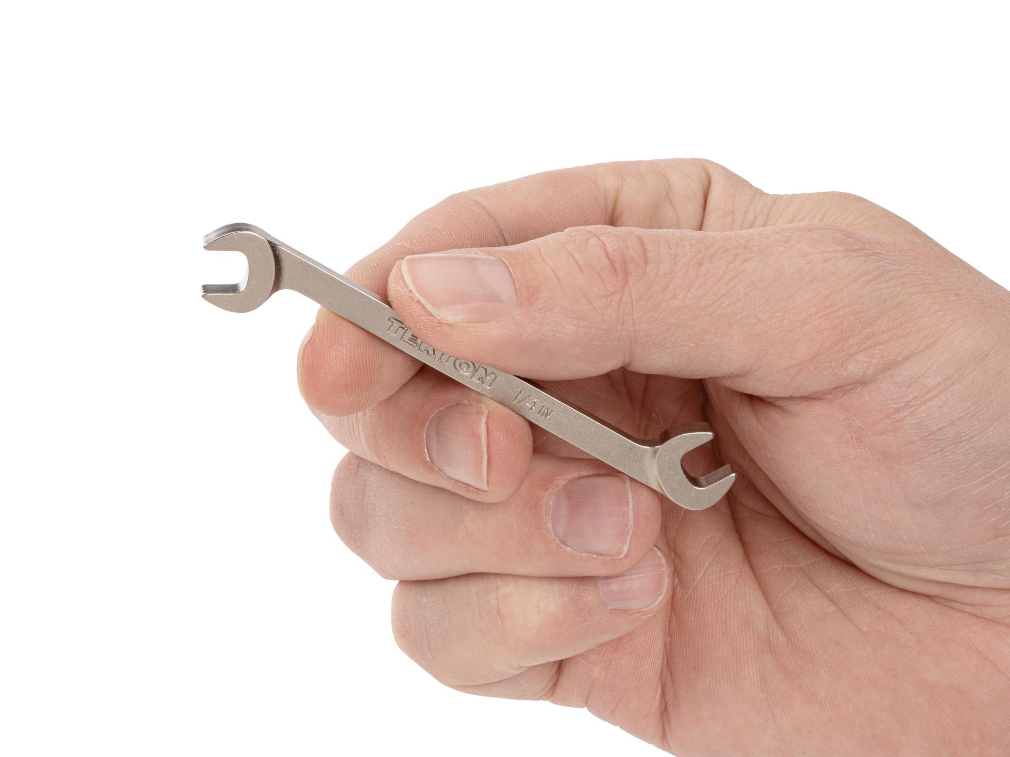 Person holding Tekton angle head wrench. Item #WAE83206
