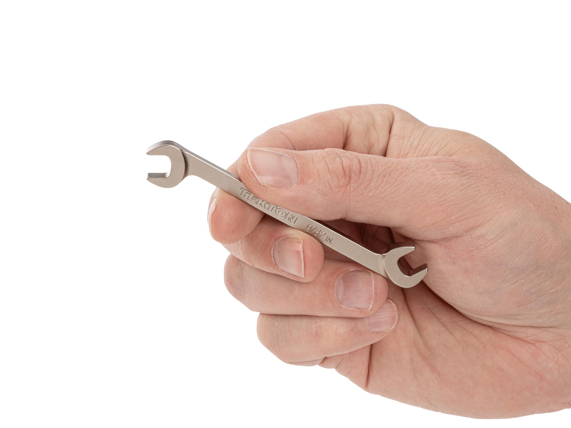 Person holding Tekton angle head wrench. Item #WAE83207