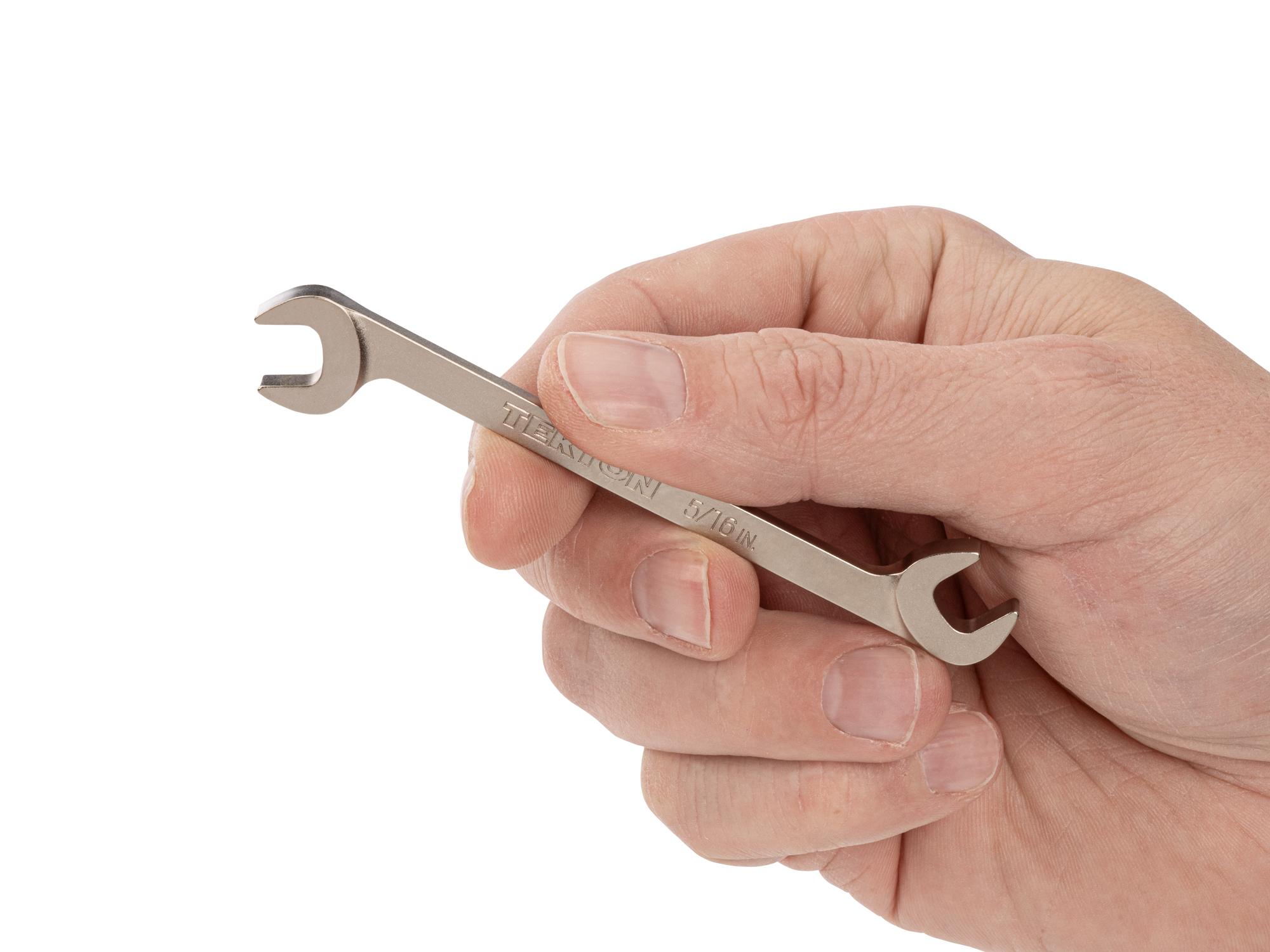 Person holding Tekton angle head wrench. Item #WAE83208