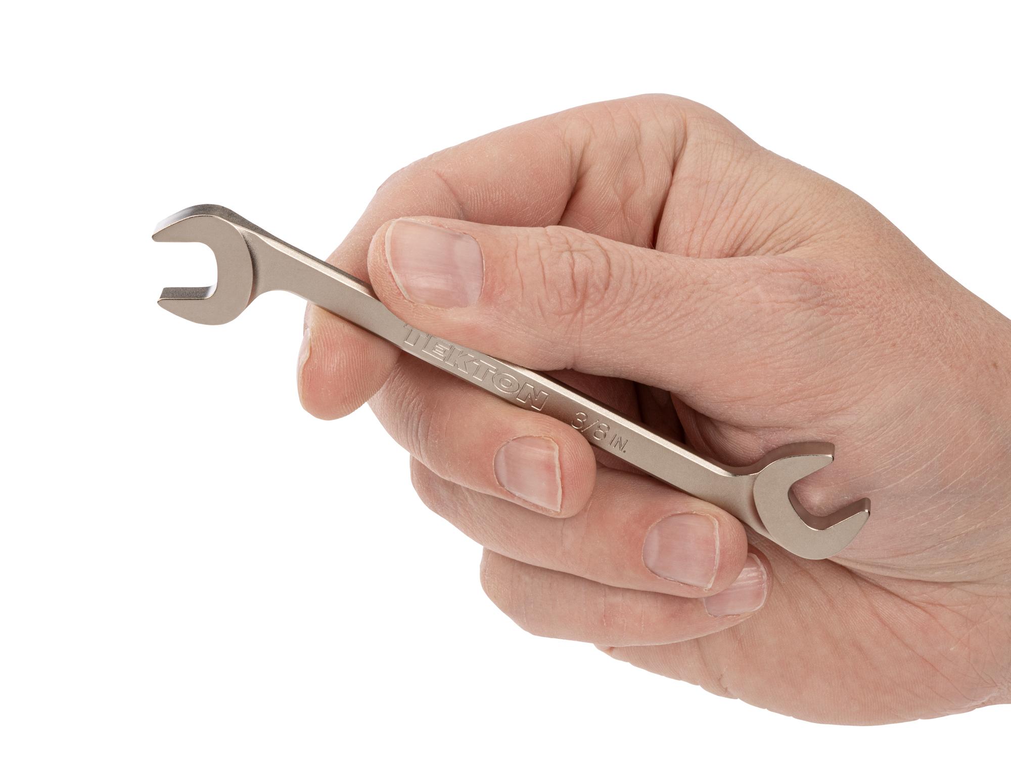 Person holding Tekton angle head wrench. Item #WAE83210
