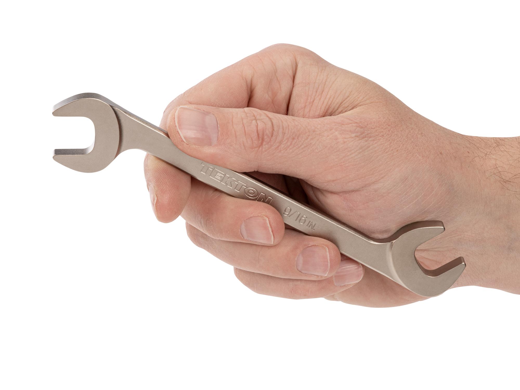 Person holding Tekton angle head wrench. Item #WAE83214