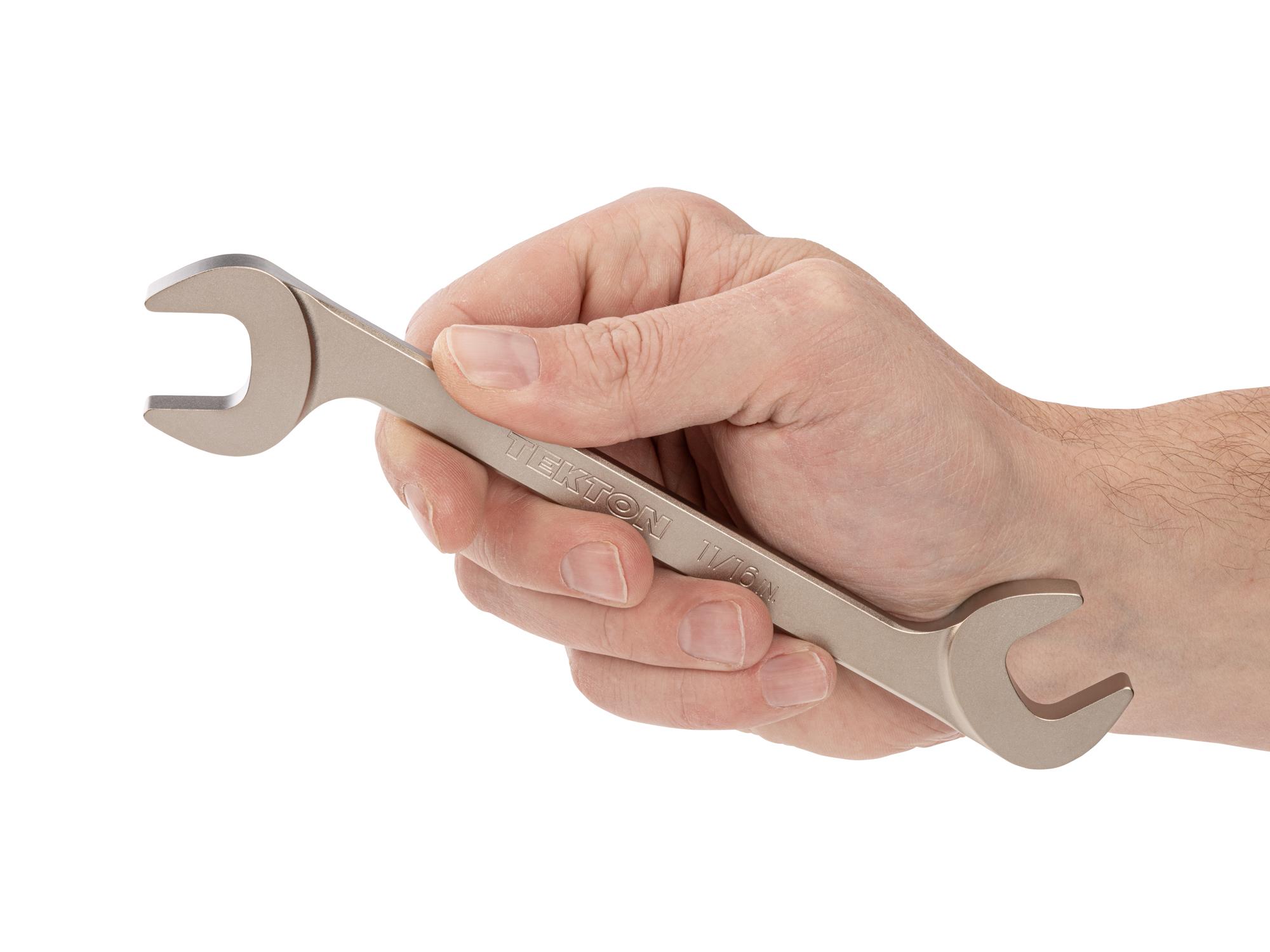 Person holding Tekton angle head wrench. Item #WAE83217