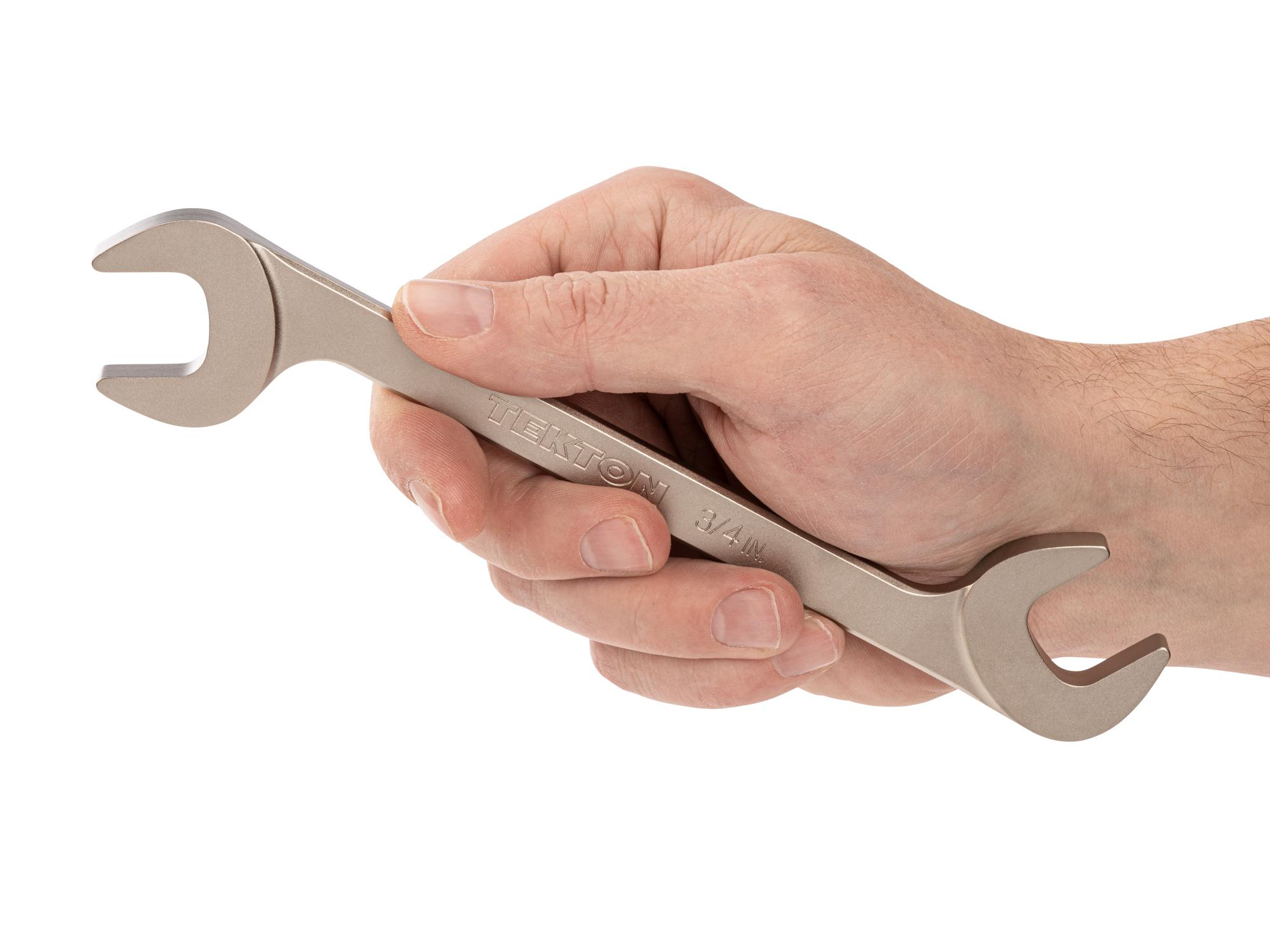 Person holding Tekton angle head wrench. Item #WAE83219