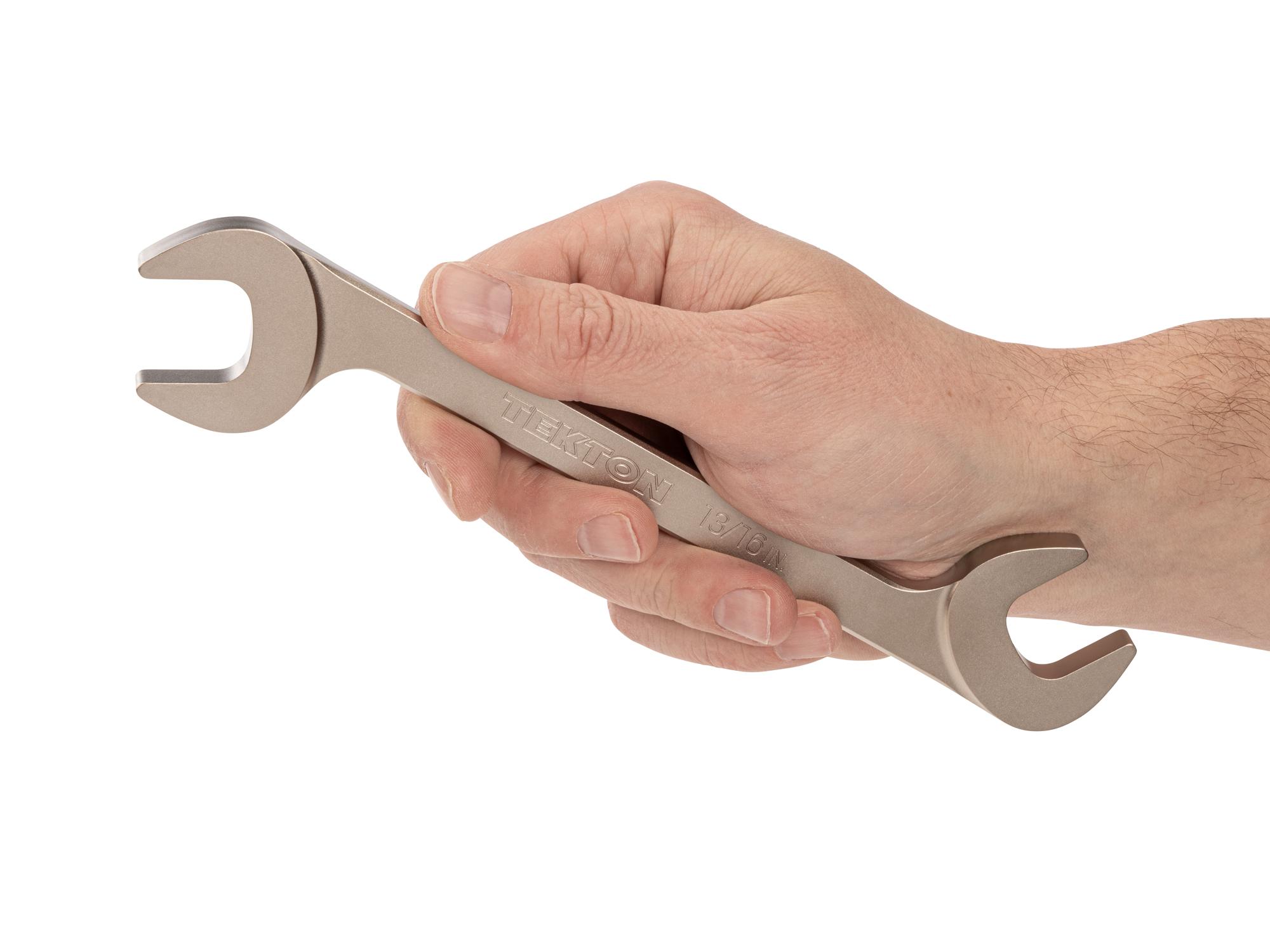Person holding Tekton angle head wrench. Item #WAE83221