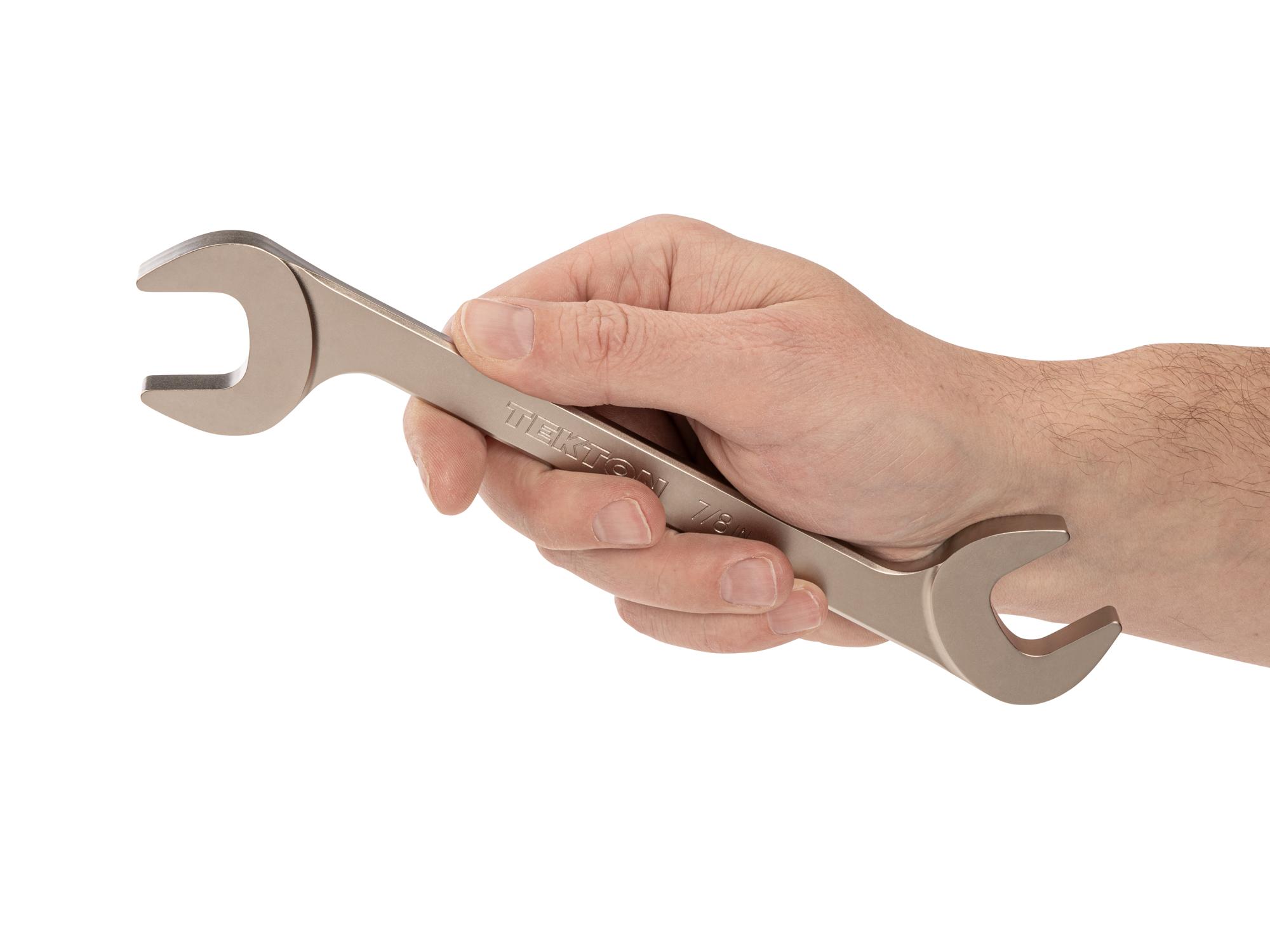 Person holding Tekton angle head wrench. Item #WAE83222