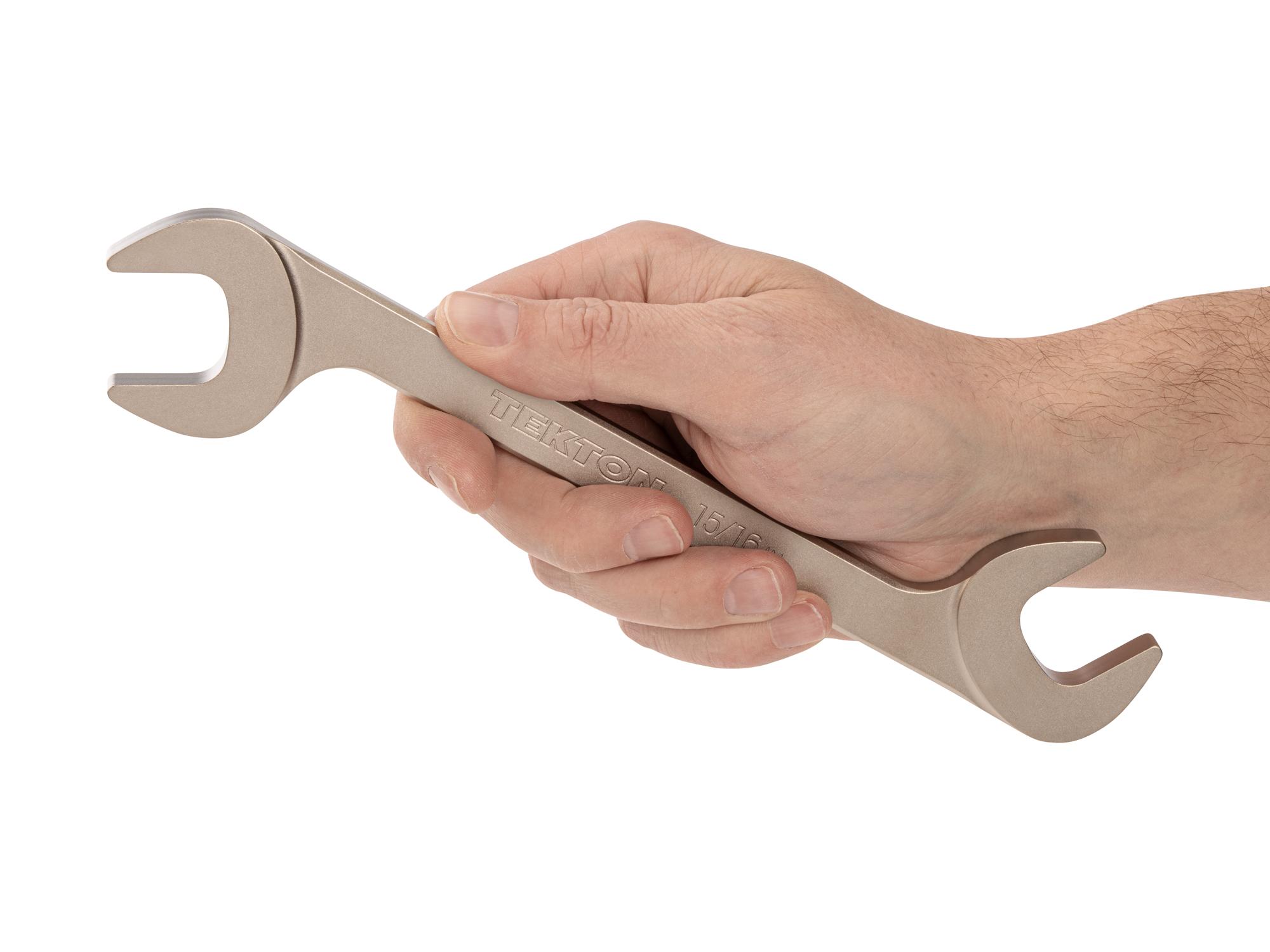 Person holding Tekton angle head wrench. Item #WAE83224