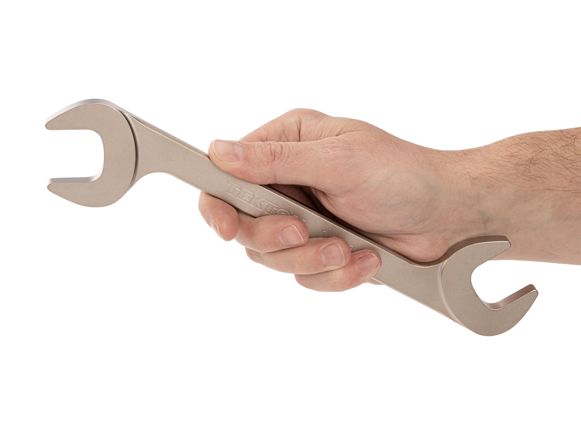 Person holding Tekton angle head wrench. Item #WAE83227