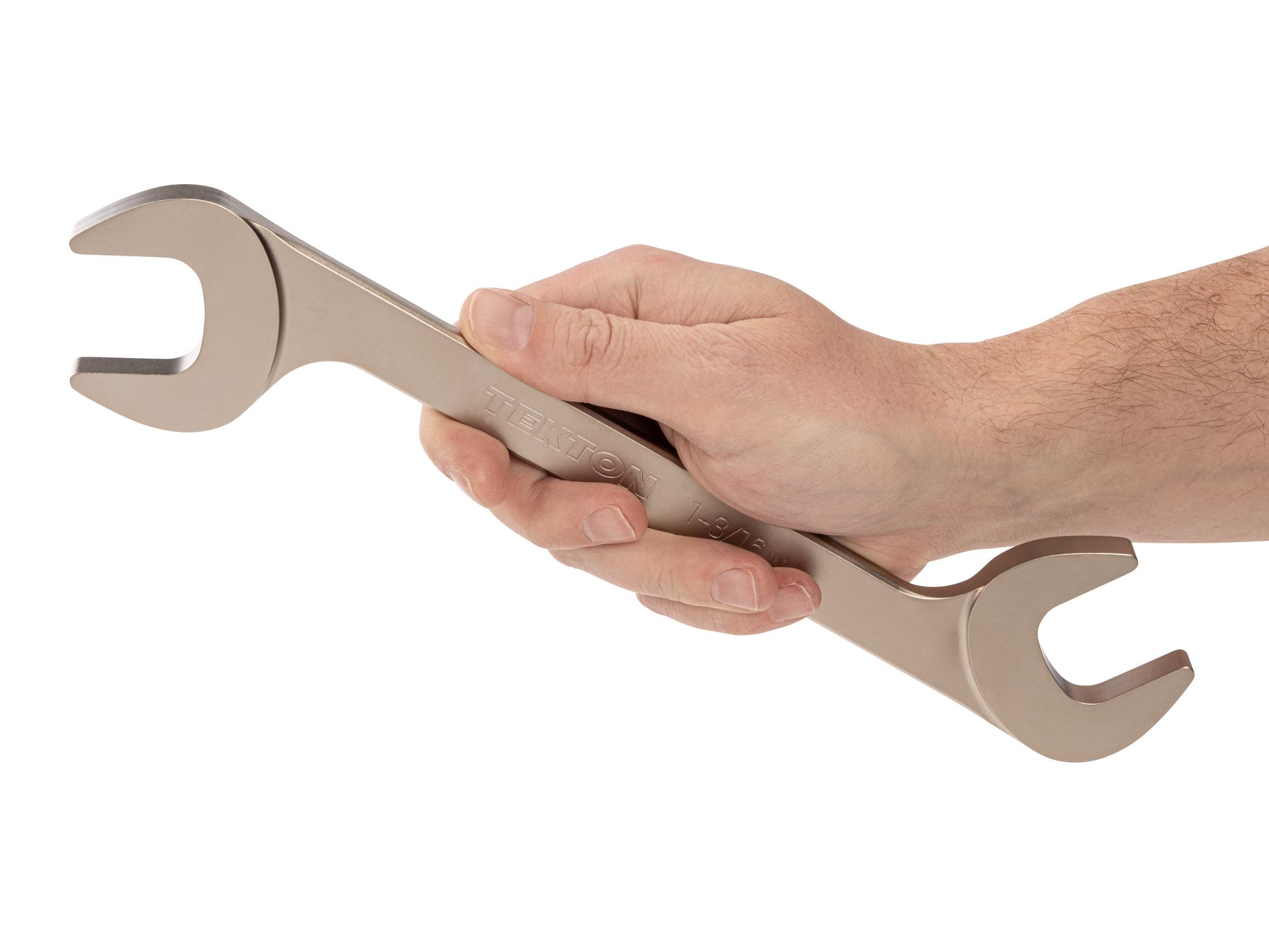 Person holding Tekton angle head wrench. Item #WAE83230