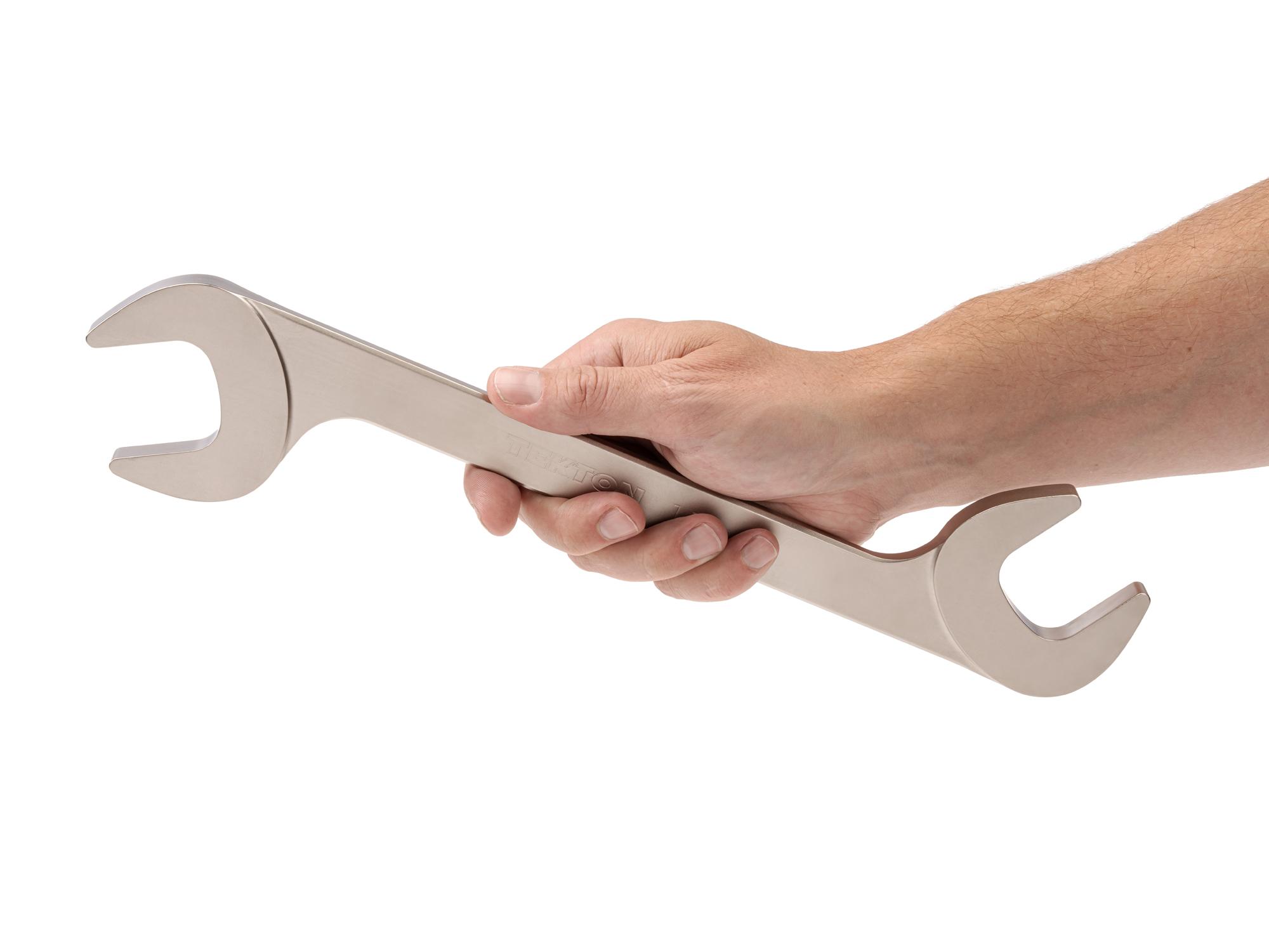 Person holding Tekton angle head wrench. Item #WAE83238