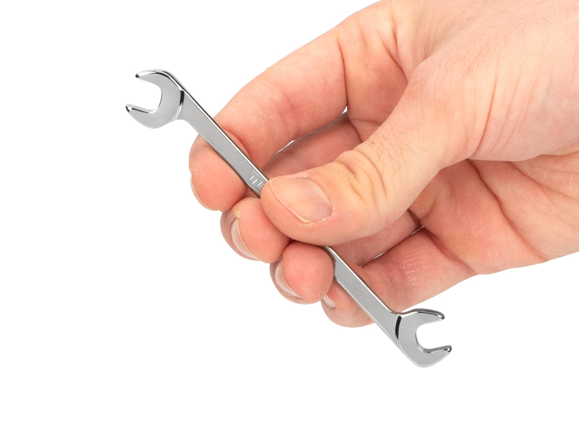 Person holding Tekton 7 millimeter angle head wrench. Item #WAE84007