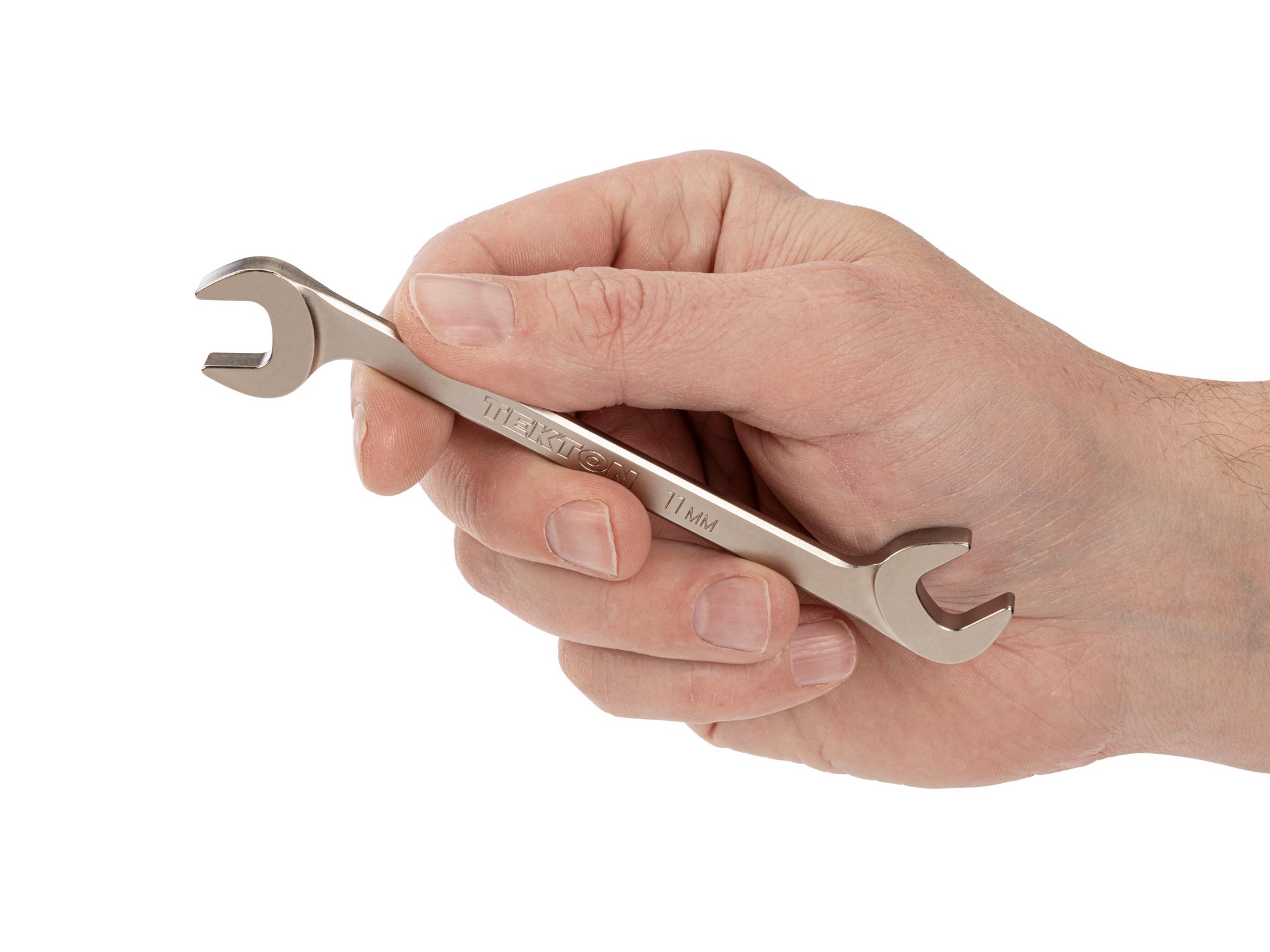 Person holding Tekton angle head wrench. Item #WAE84211