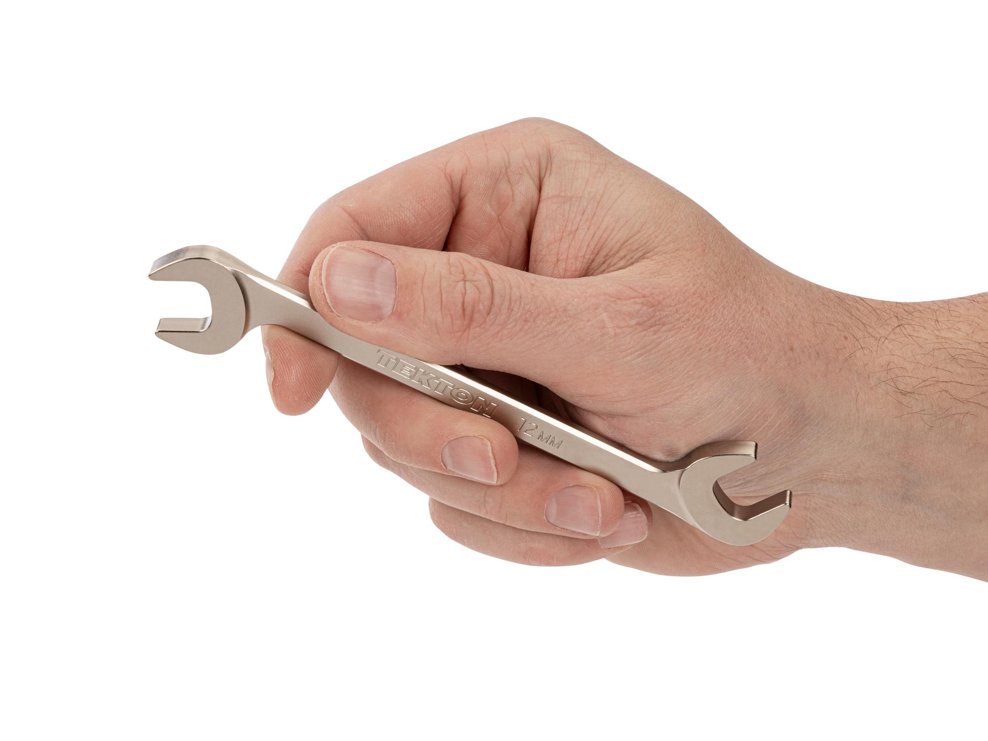 Person holding Tekton angle head wrench. Item #WAE84212