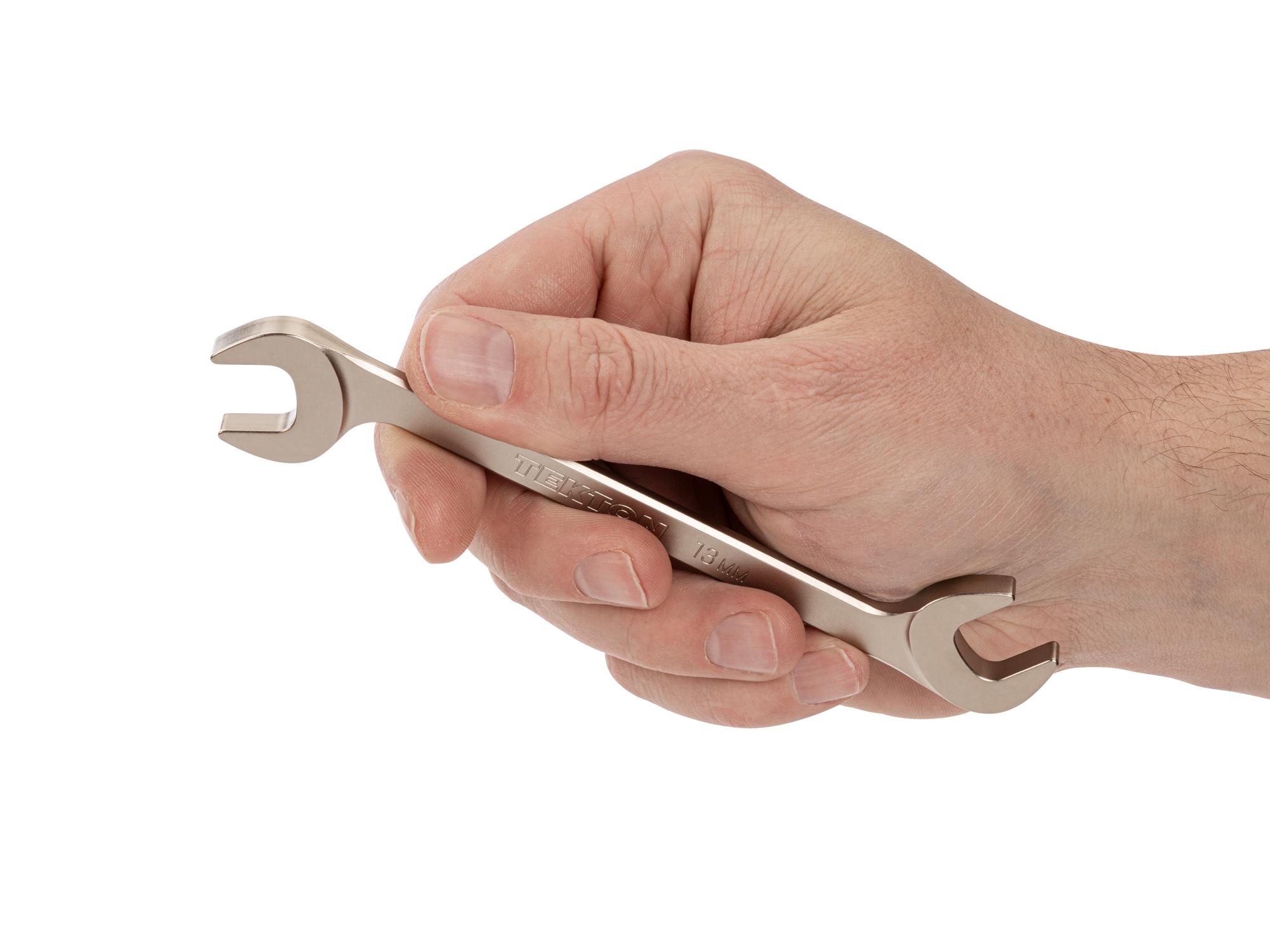 Person holding Tekton angle head wrench. Item #WAE84213