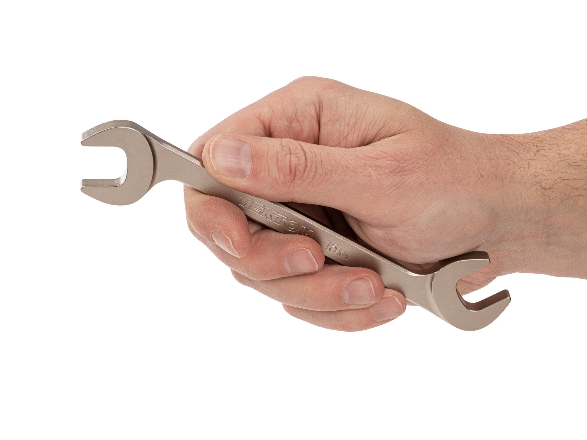 Person holding Tekton angle head wrench. Item #WAE84216