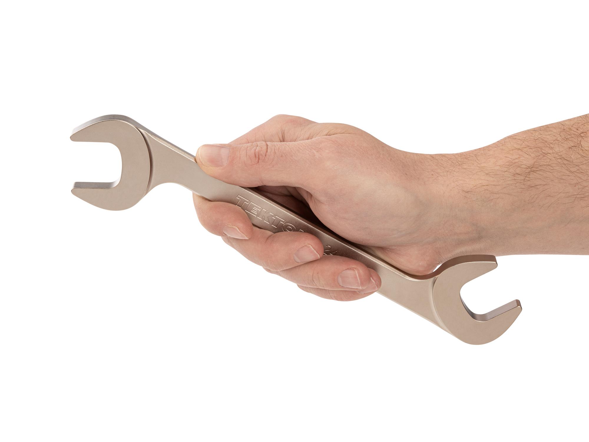 Person holding Tekton angle head wrench. Item #WAE84224