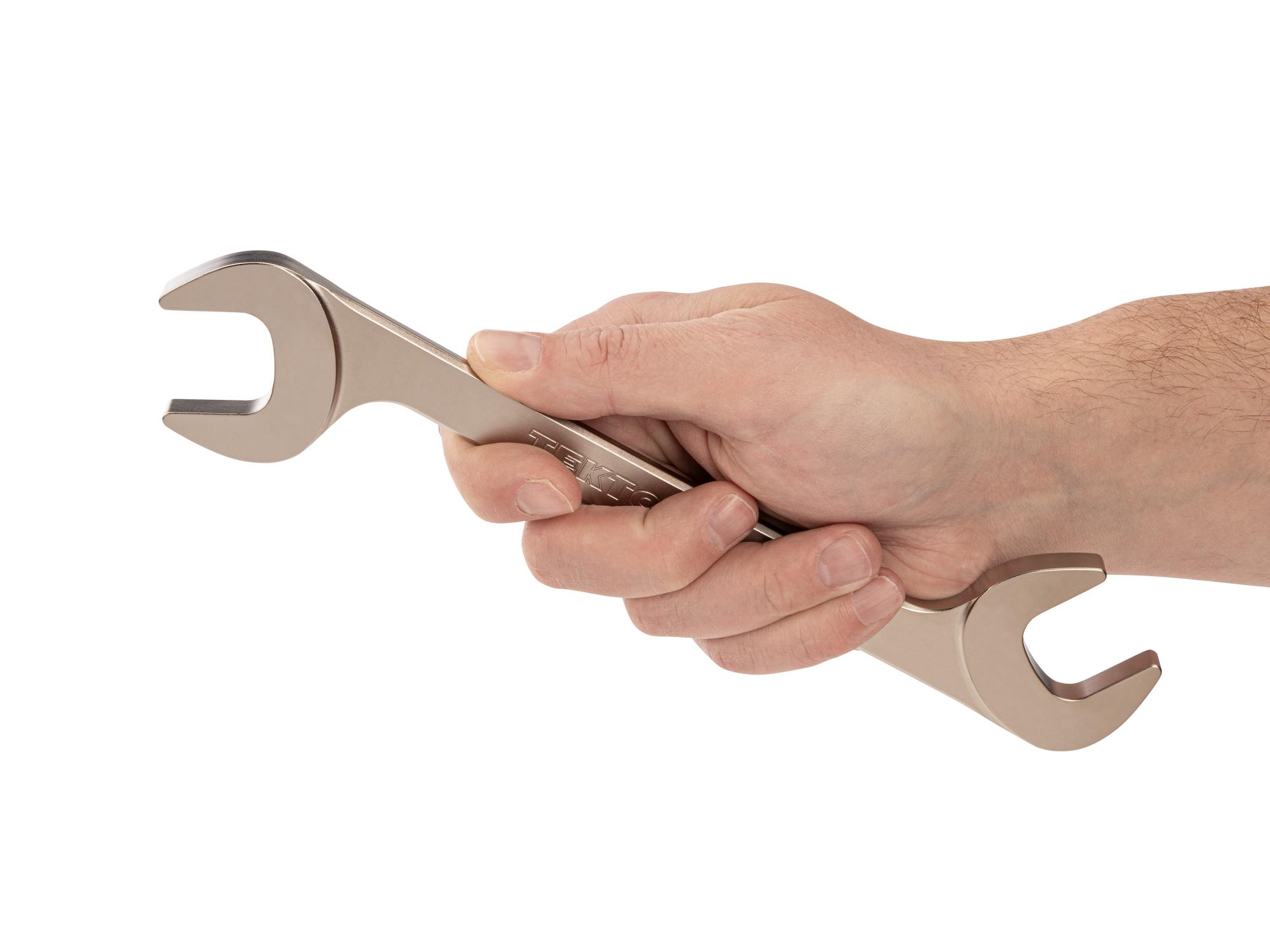 Person holding Tekton angle head wrench. Item #WAE84225