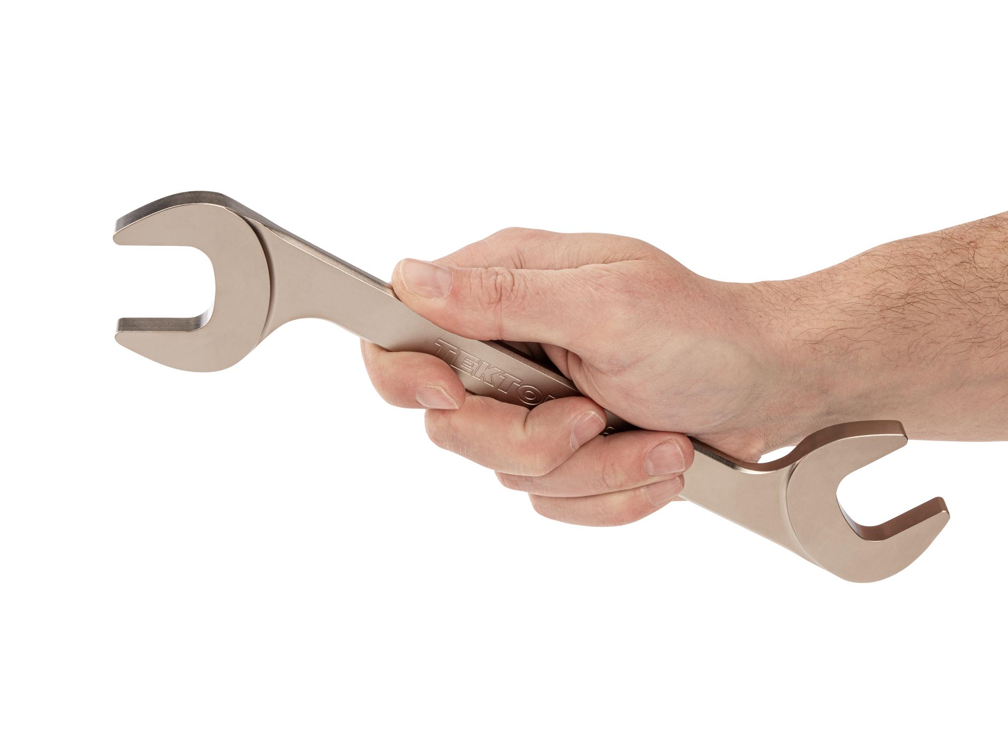 Person holding Tekton angle head wrench. Item #WAE84228