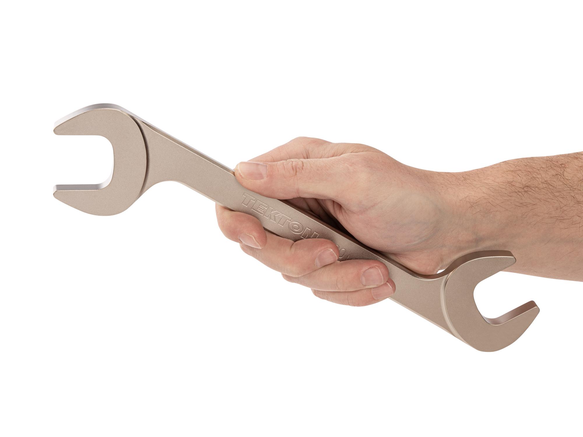 Person holding Tekton angle head wrench. Item #WAE84230