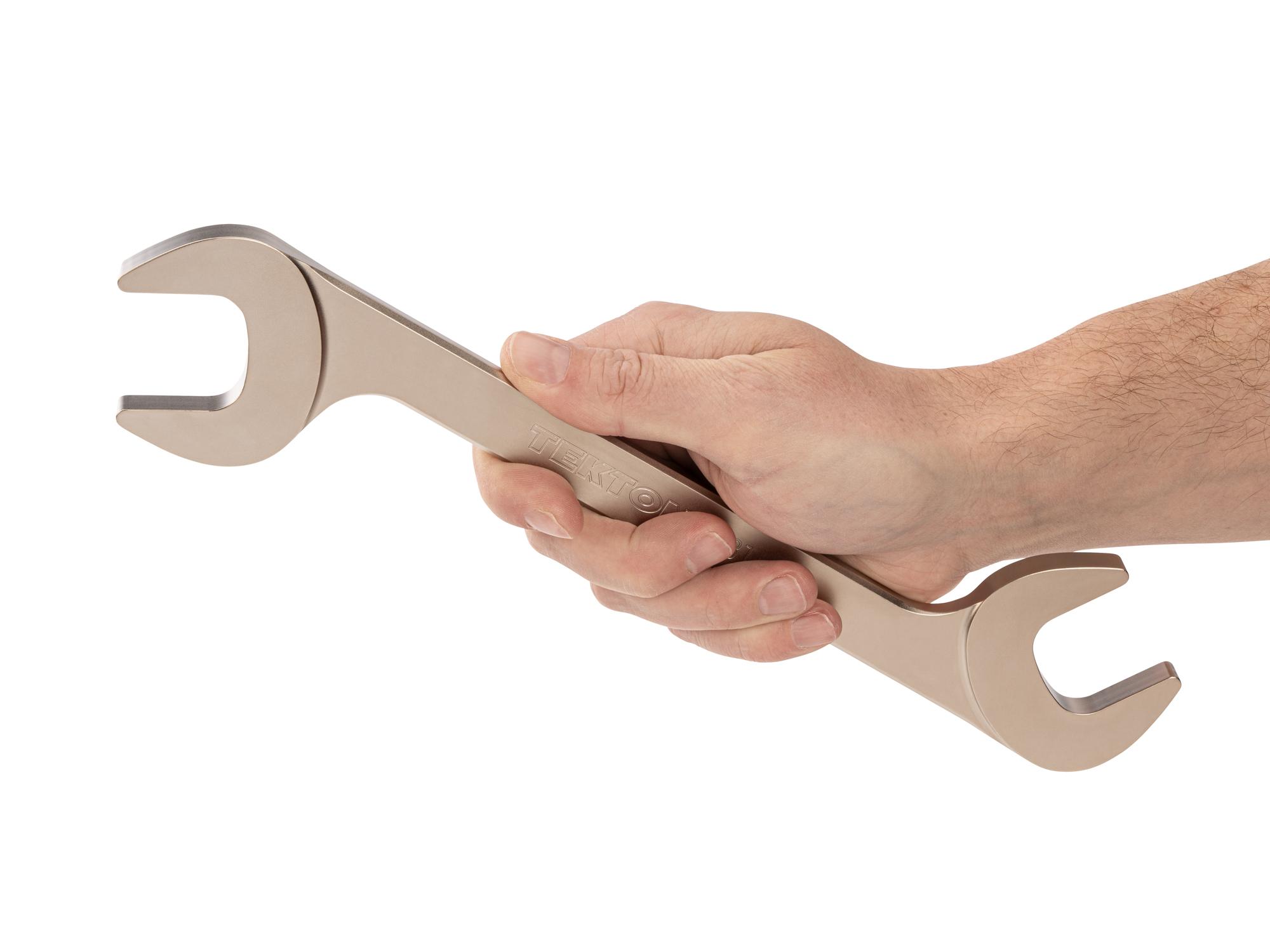 Person holding Tekton angle head wrench. Item #WAE84231