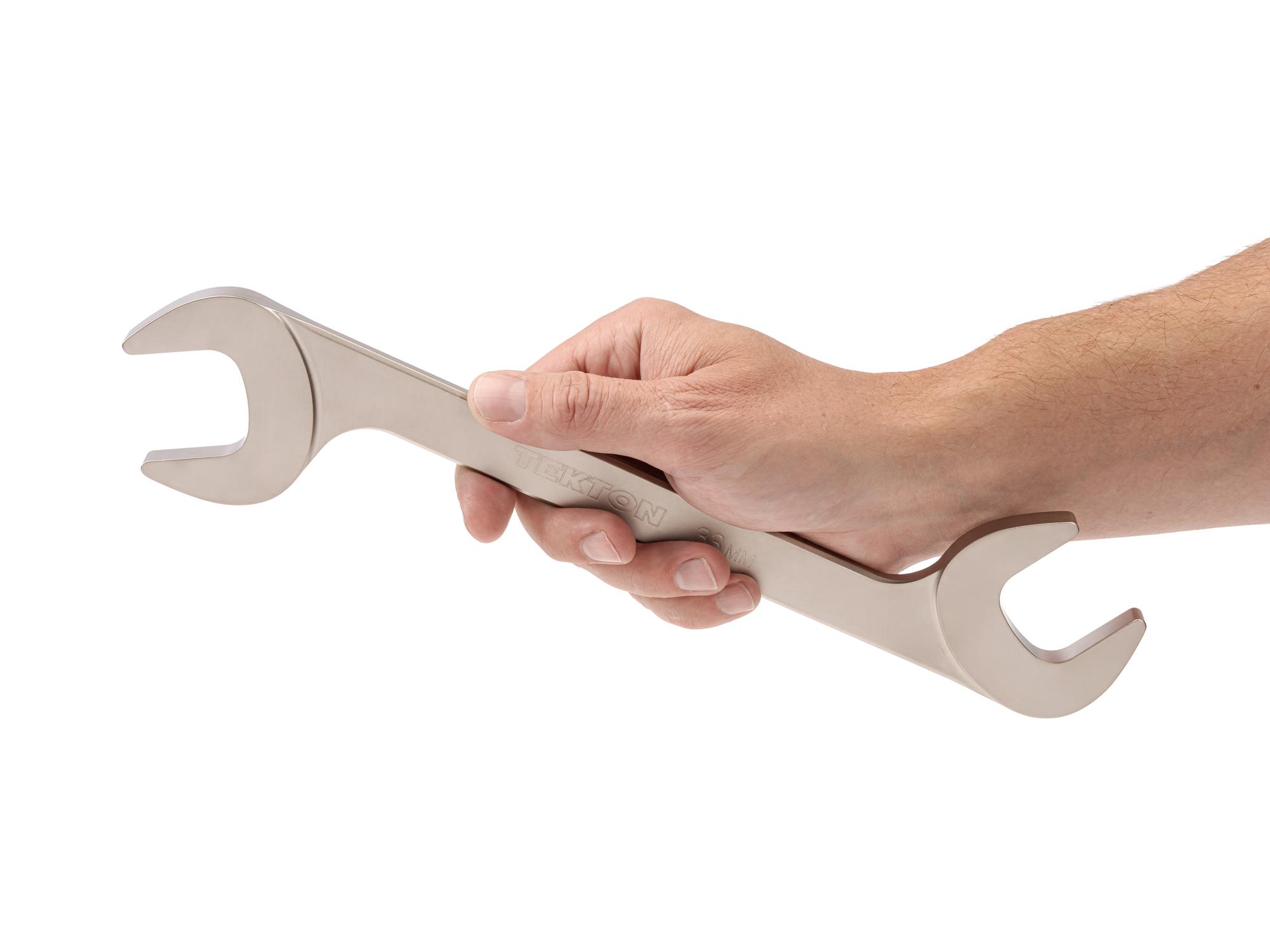 Person holding Tekton angle head wrench. Item #WAE84233