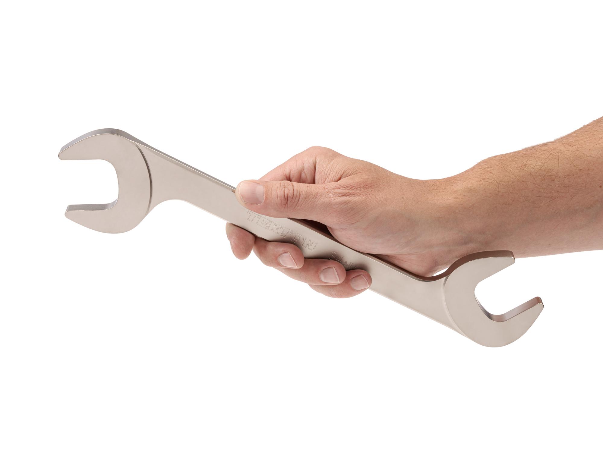 Person holding Tekton angle head wrench. Item #WAE84234