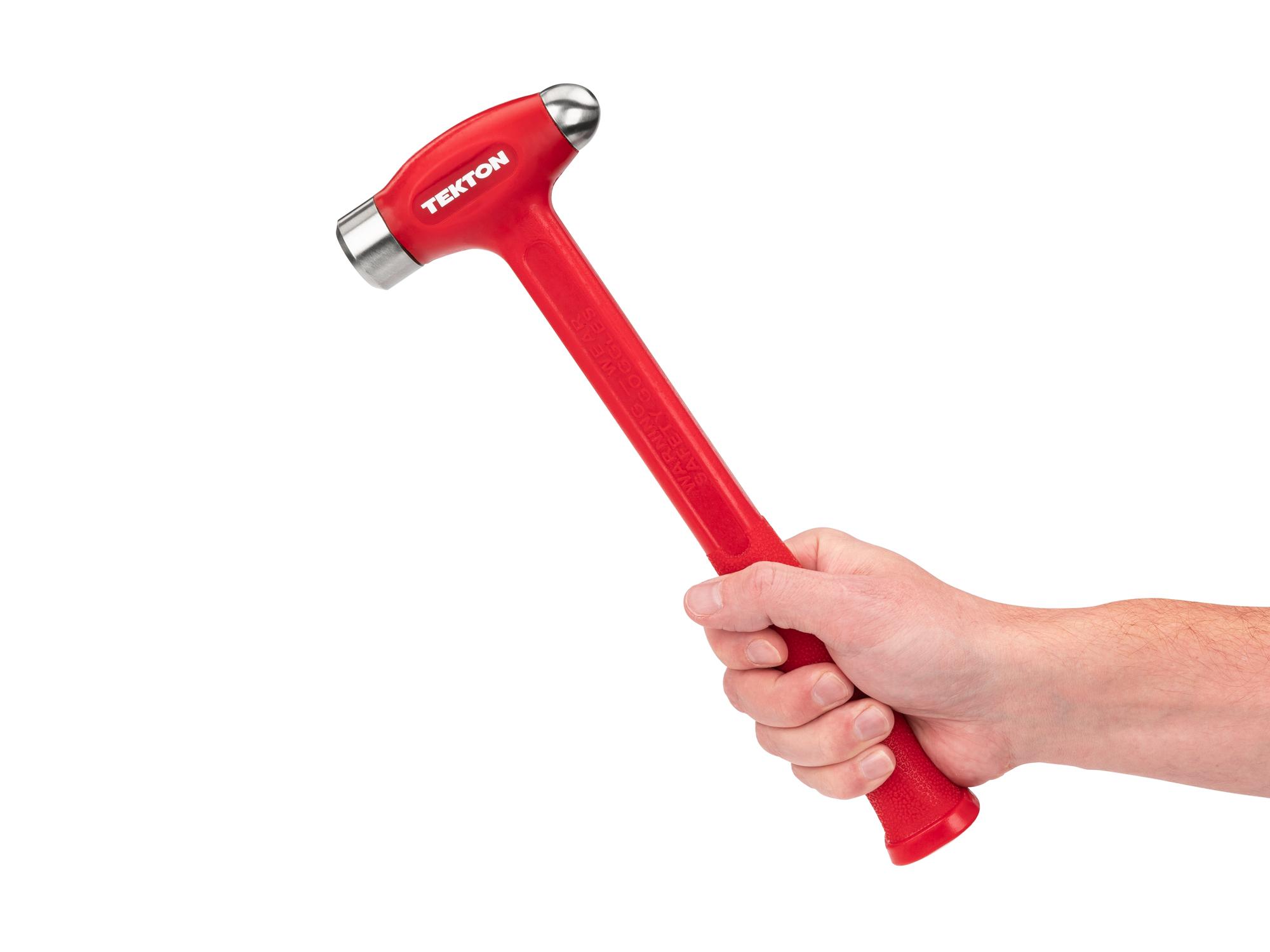 Person holding Tekton ball peen hammer. Item #HDB50026
