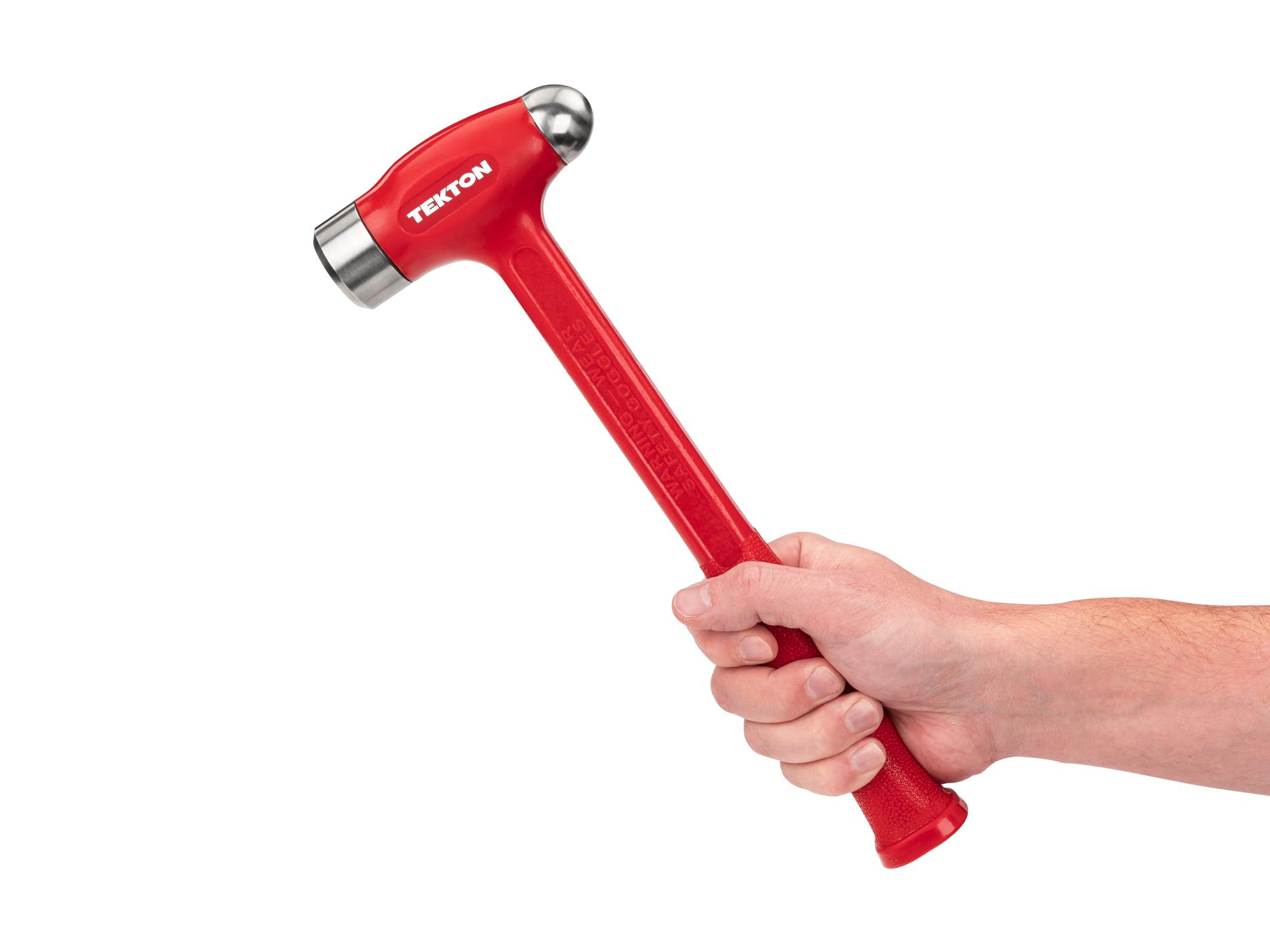 Person holding Tekton ball peen hammer. Item #HDB50036