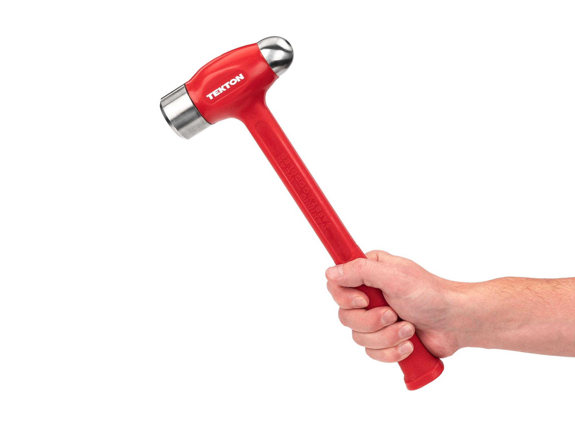 Person holding Tekton ball peen hammer. Item #HDB50047