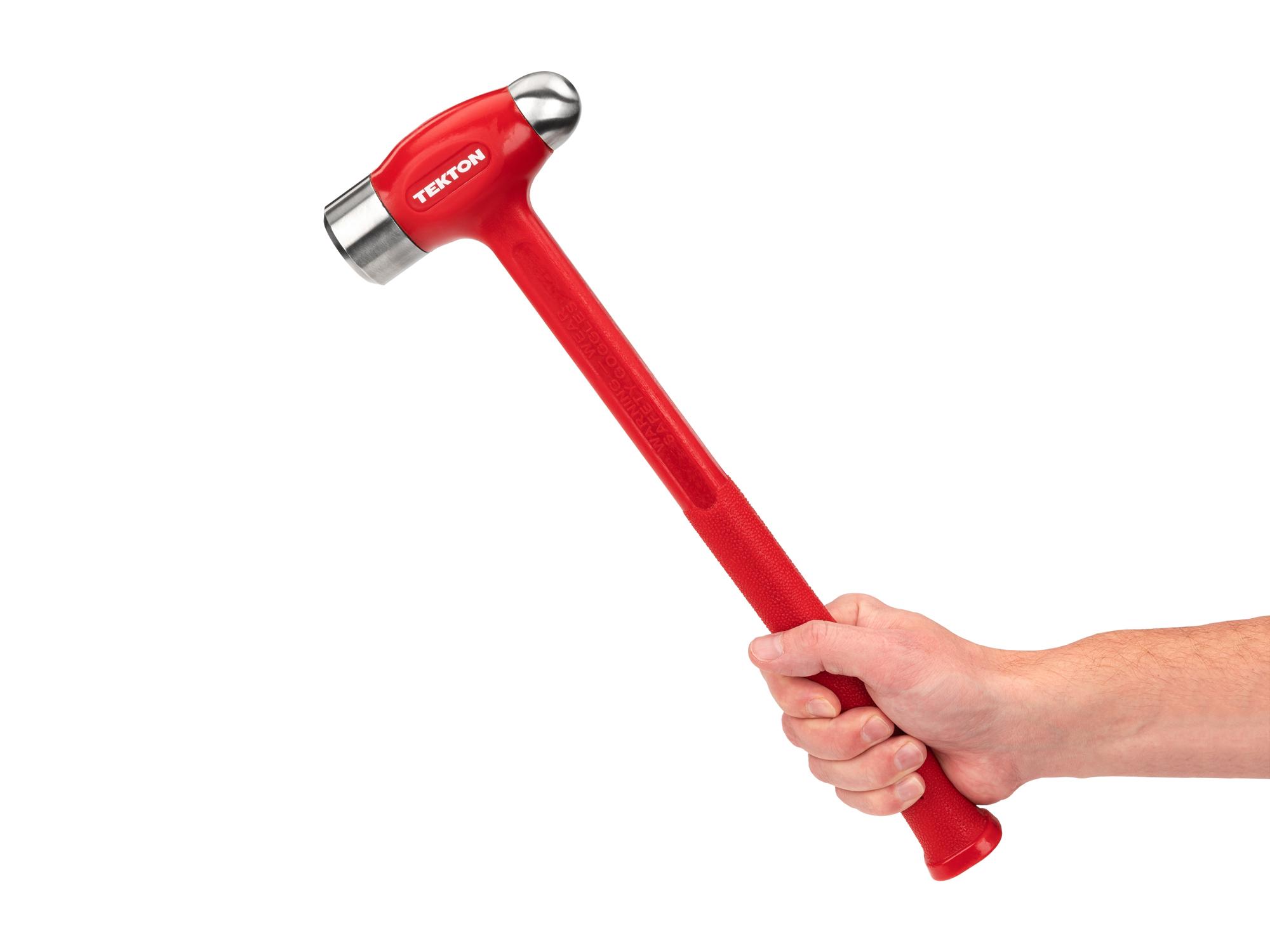 Person holding Tekton ball peen hammer. Item #HDB50050