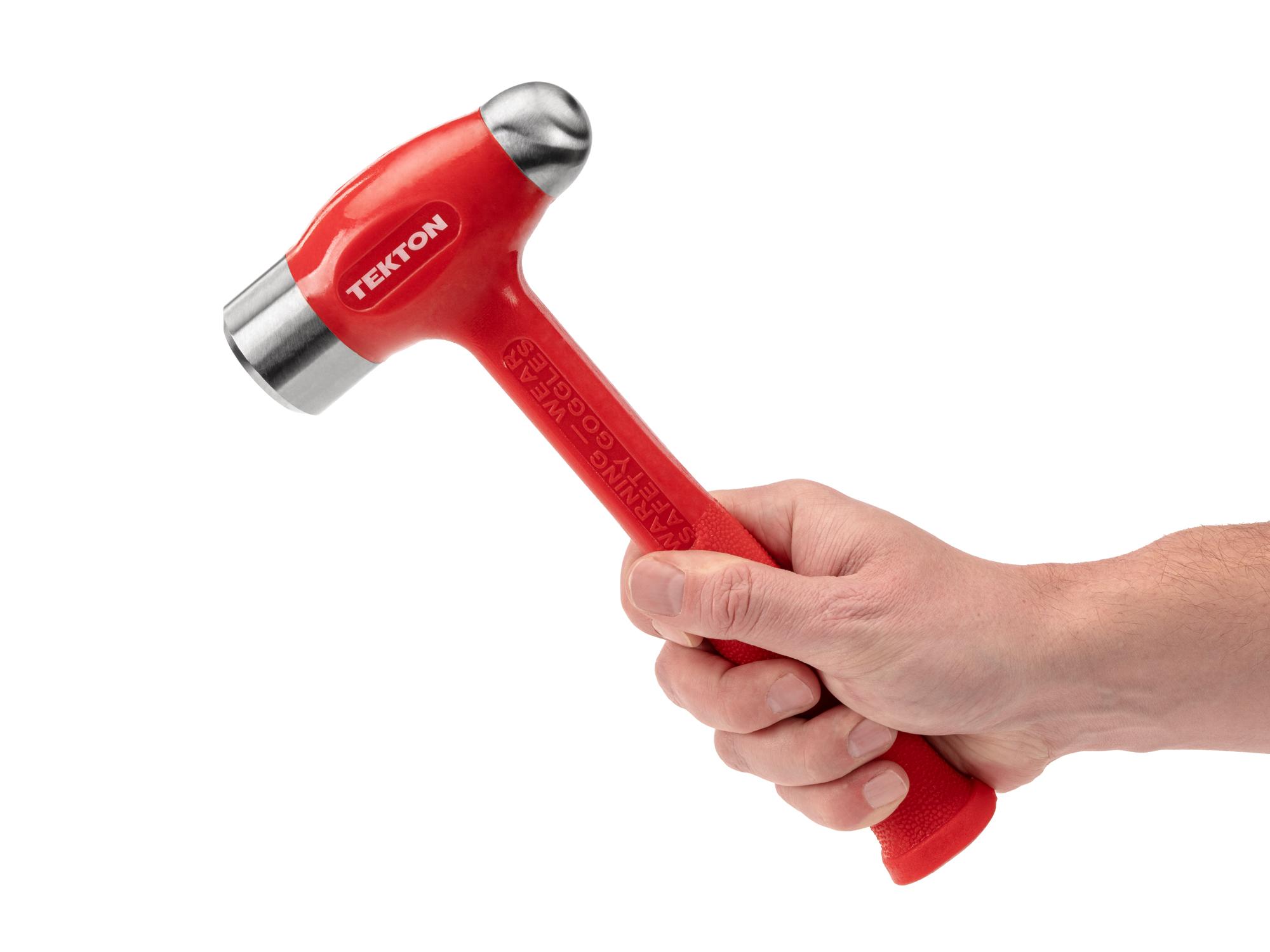 Person holding Tekton ball peen hammer. Item #HDB51043
