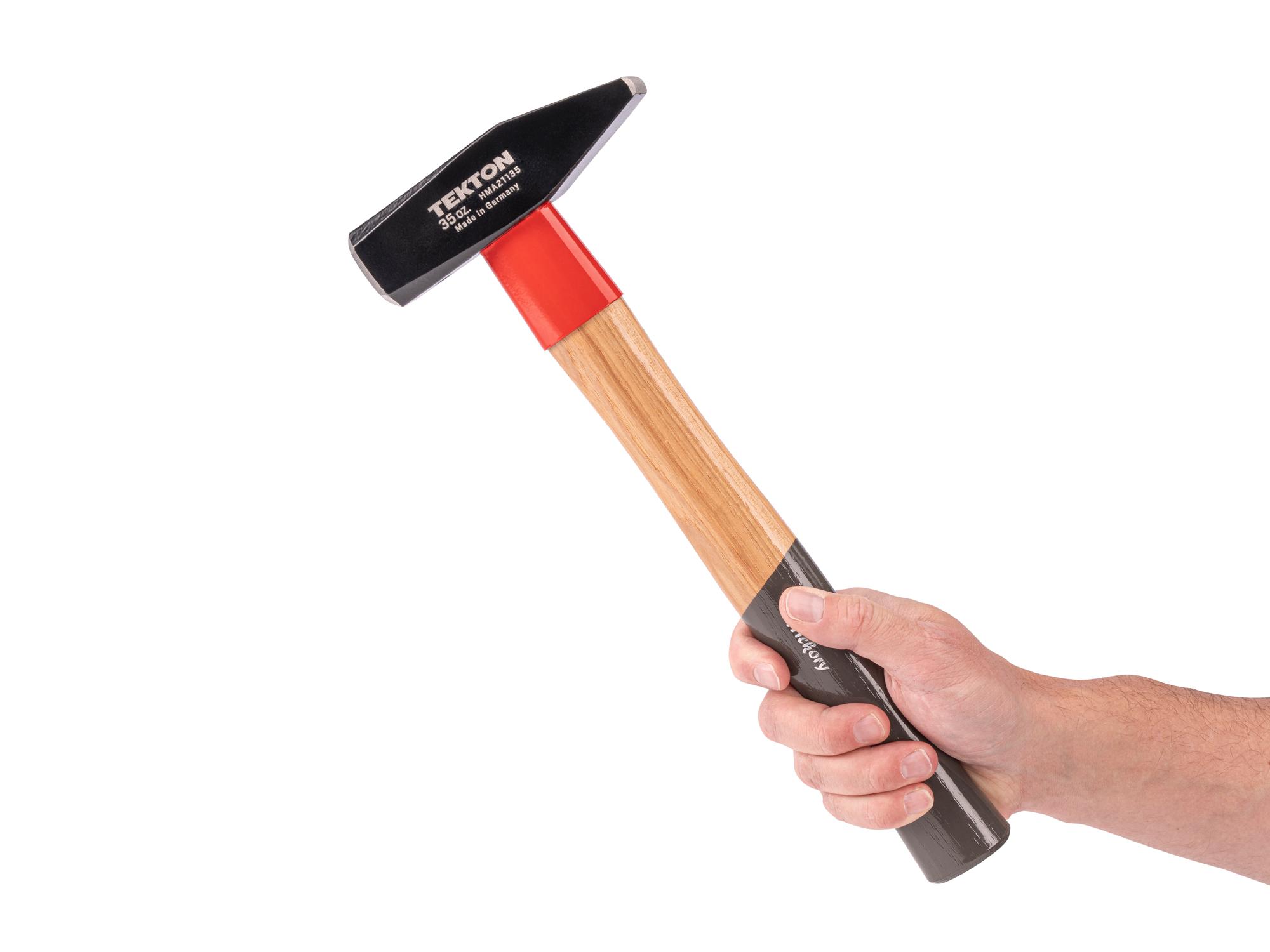 Person holding Tekton ball peen hammer. Item #HMA21135