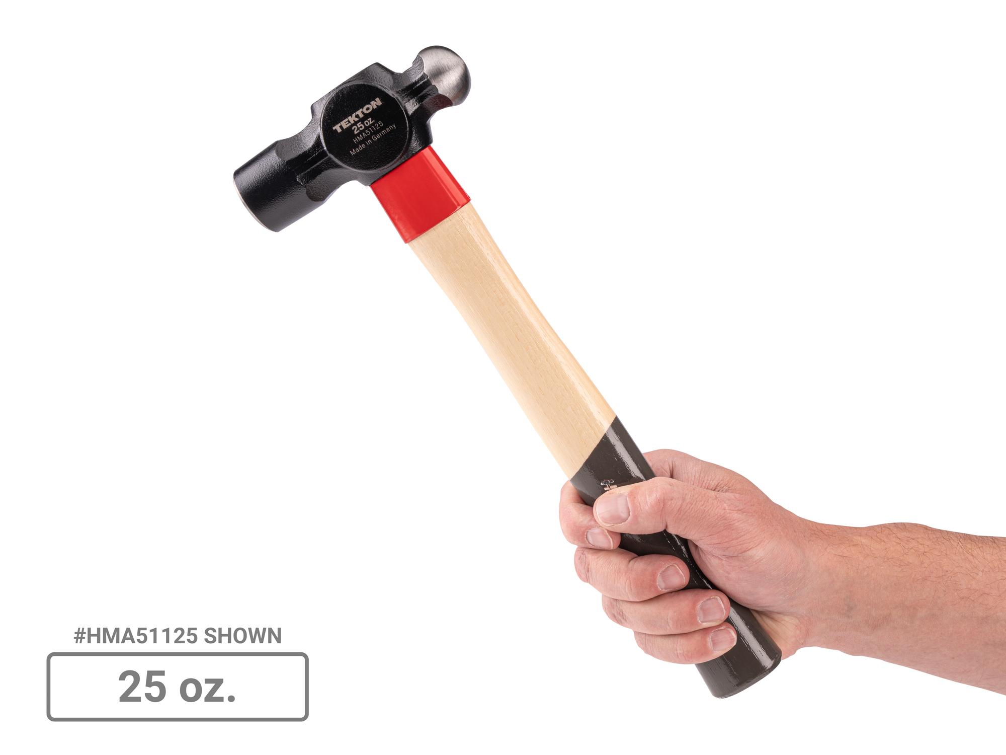 Person holding Tekton ball peen hammer set. Item #HMA95002