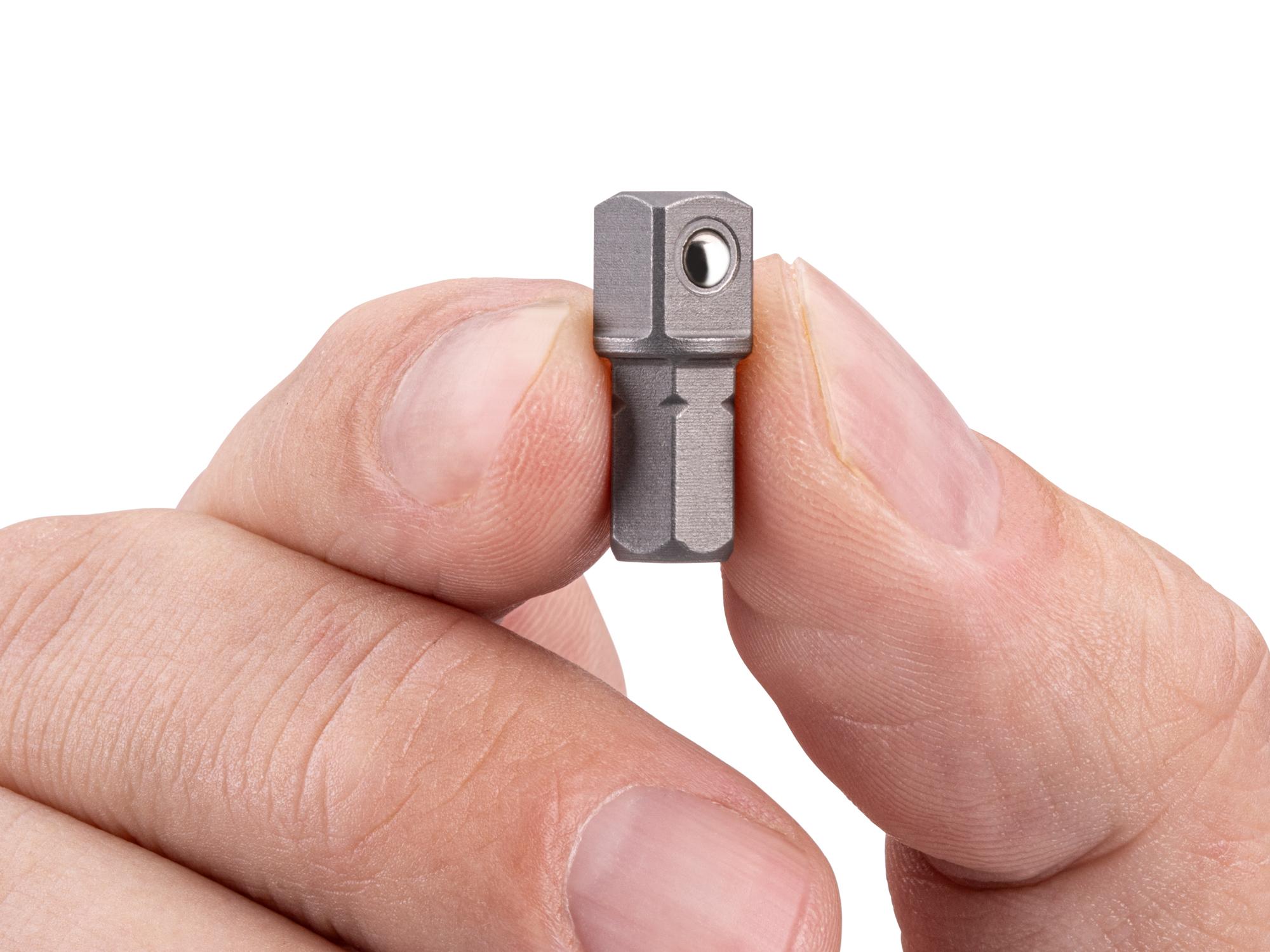 Person holding Tekton bit. Item #DZA31500