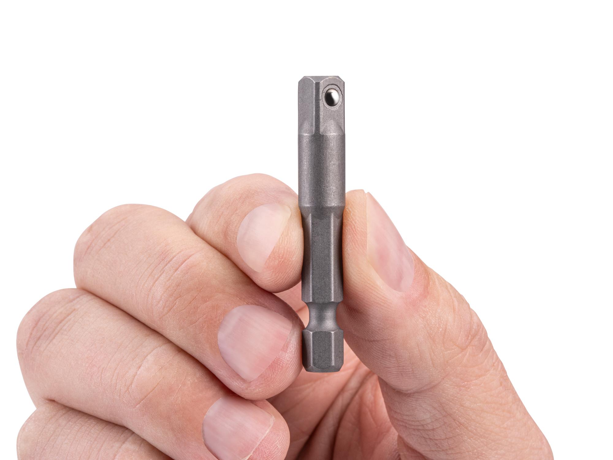 Person holding Tekton bit. Item #DZA41502