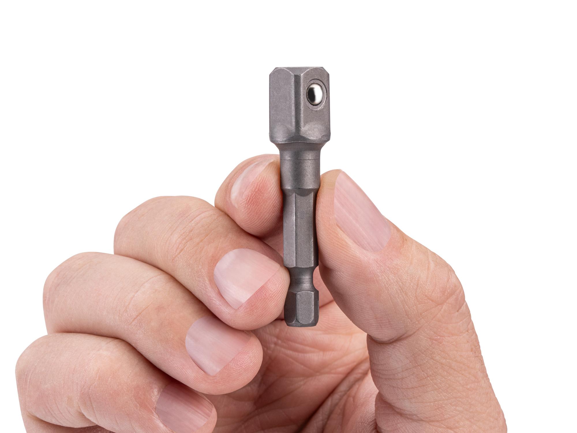 Person holding Tekton bit. Item #DZA41602