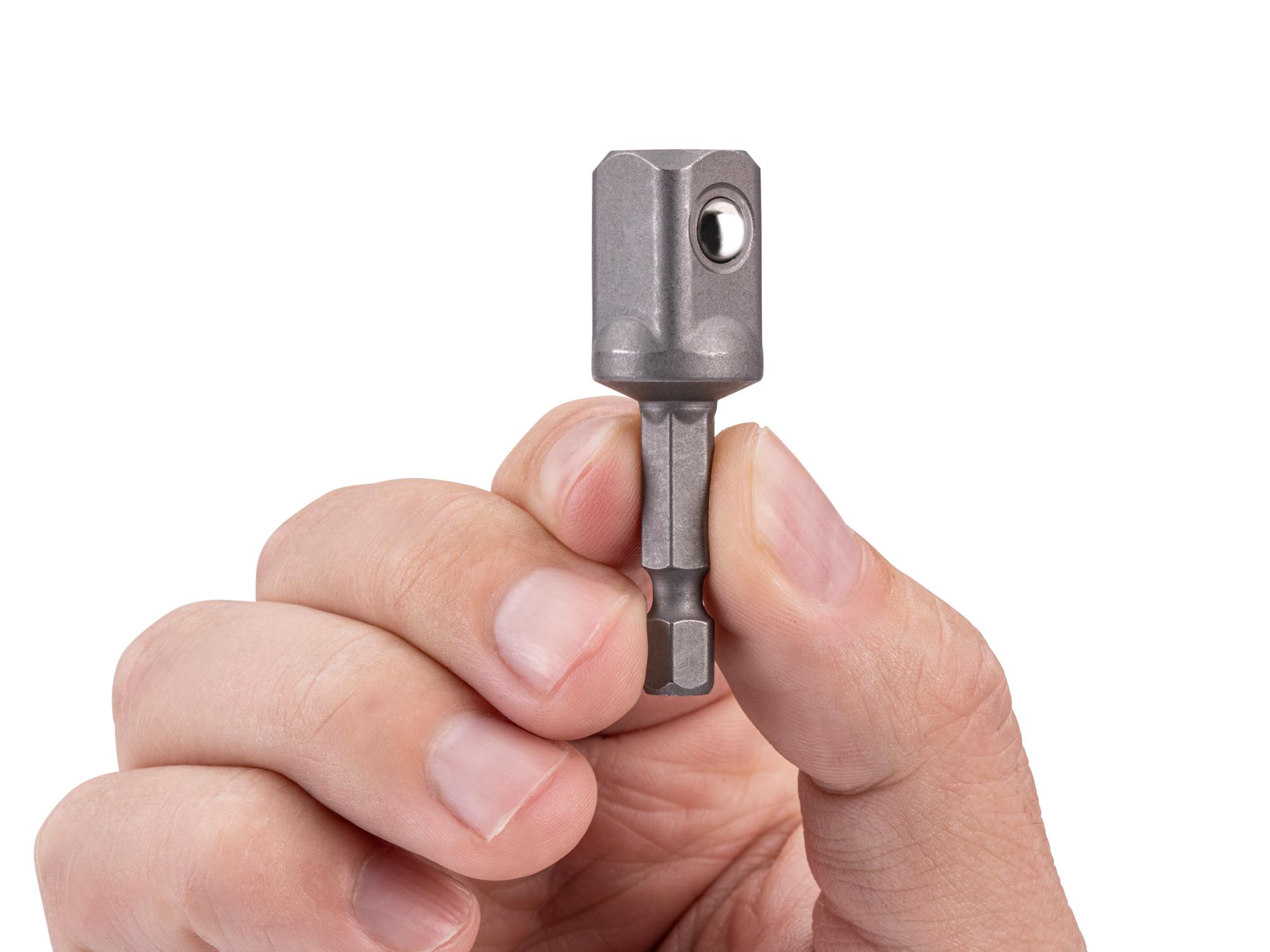 Person holding Tekton bit. Item #DZA41702