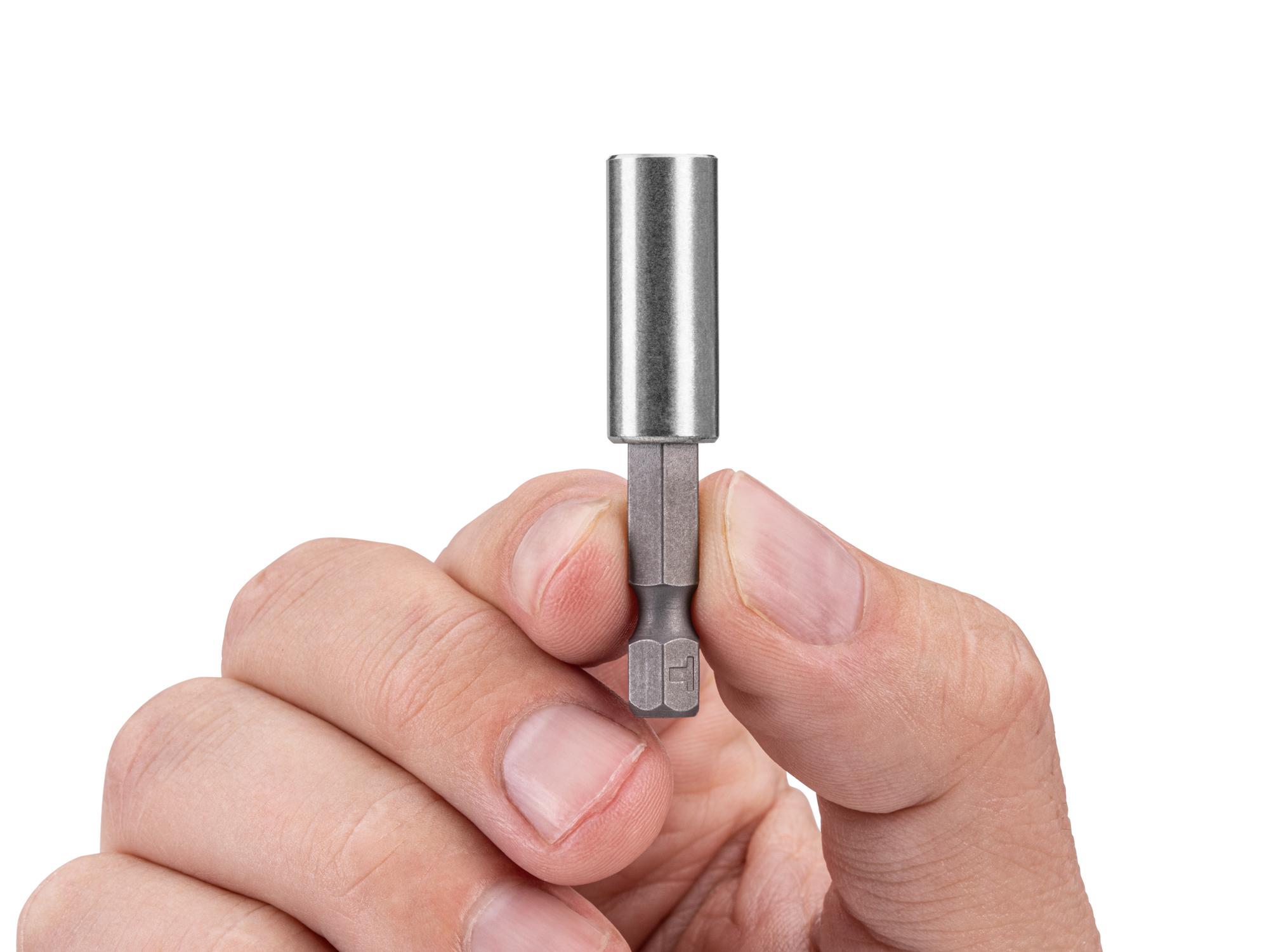 Person holding Tekton 2 inch bit. Item #DZA42005