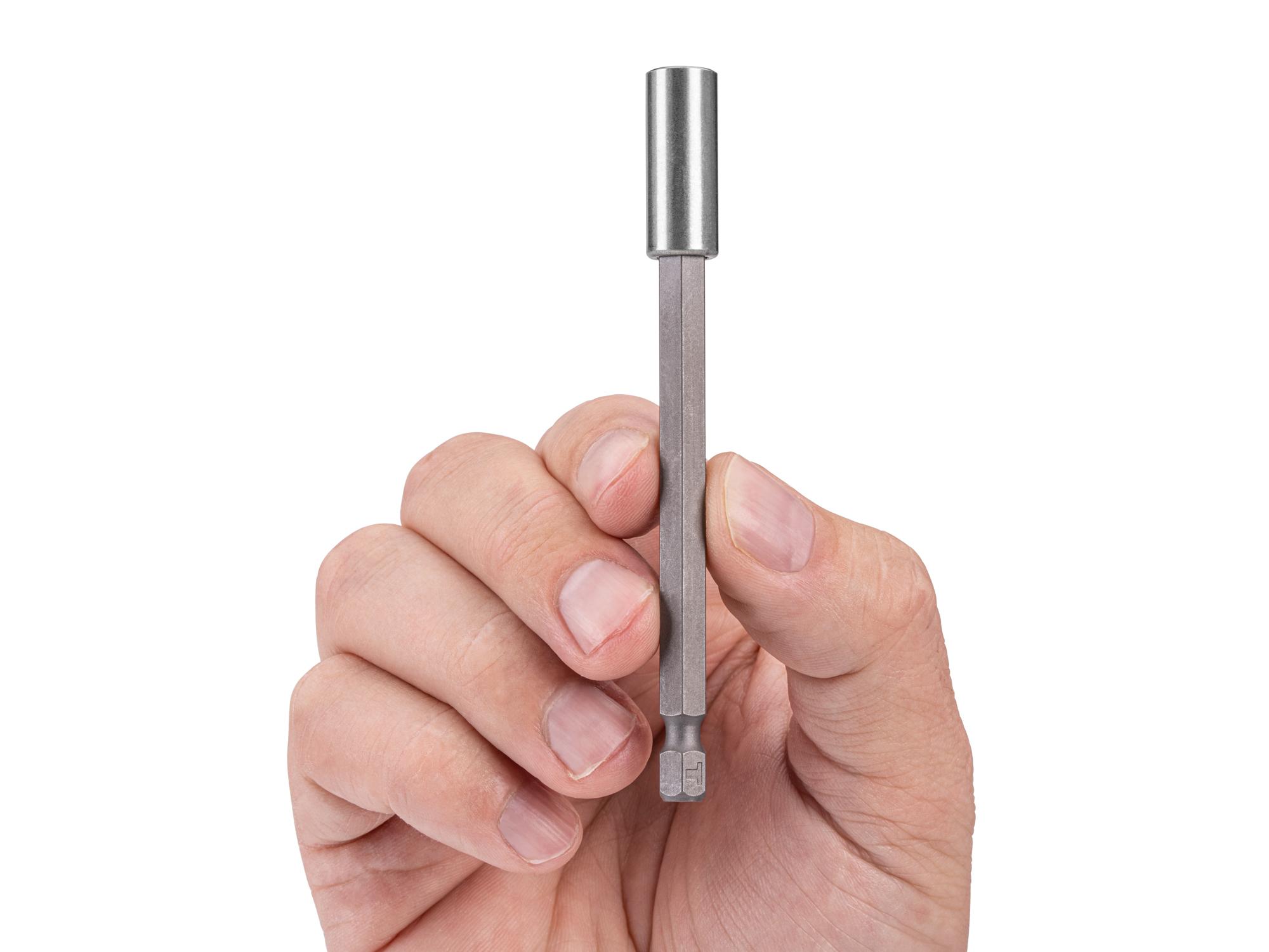 Person holding Tekton 4 inch bit. Item #DZA42010