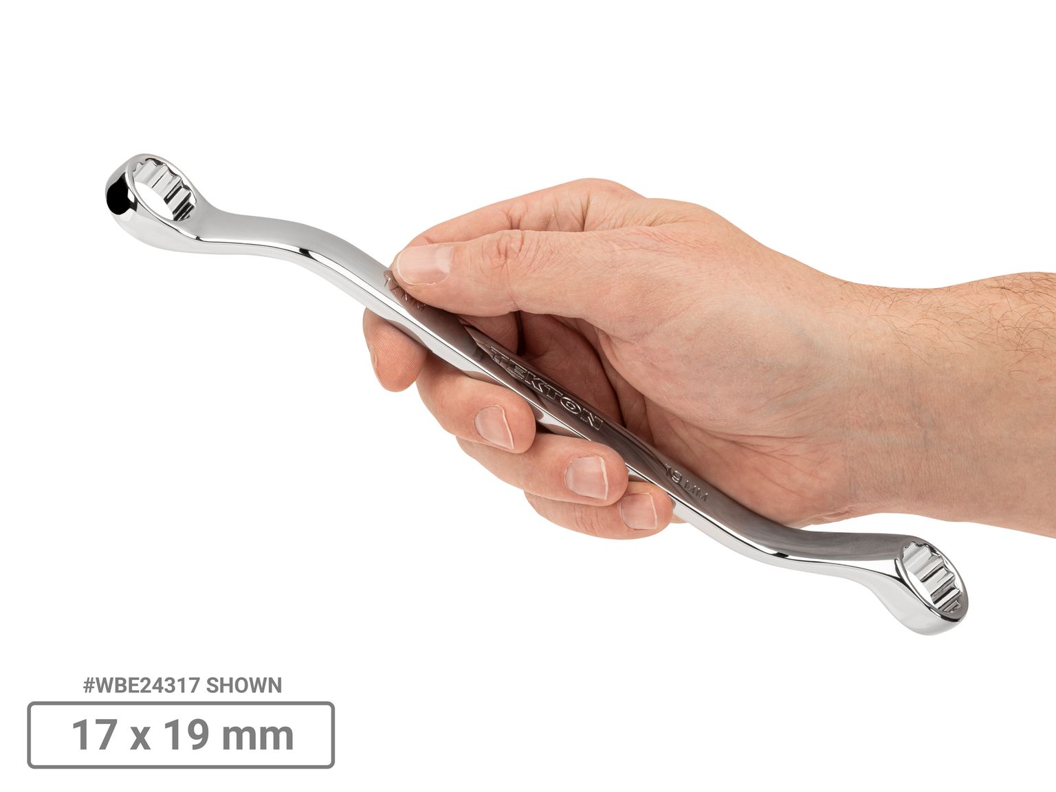 Person holding Tekton 17 x 19 millimeter box end wrench. Item #WBE24317