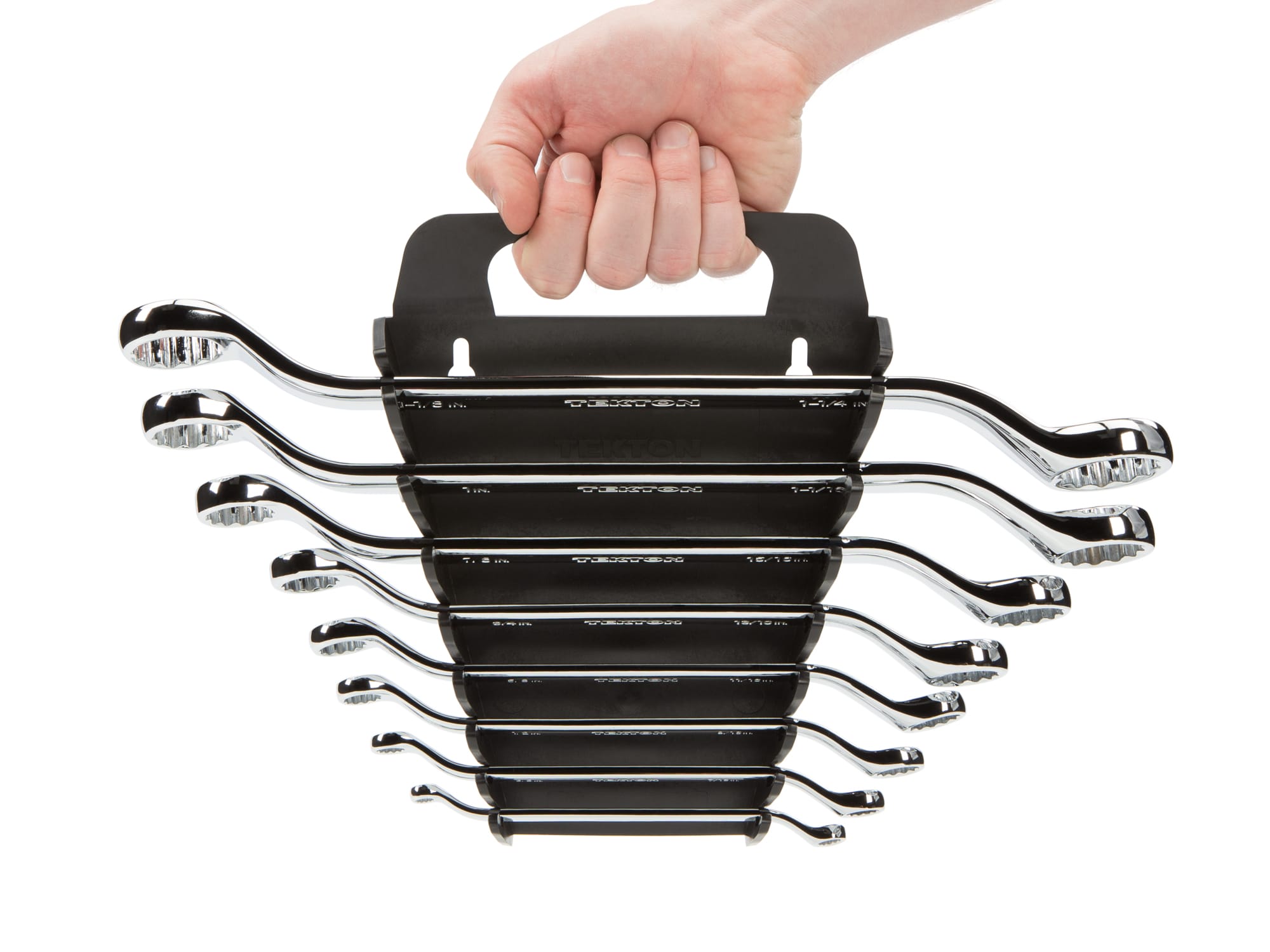 Person Holding 8-piece inch box end wrench set in a black holder