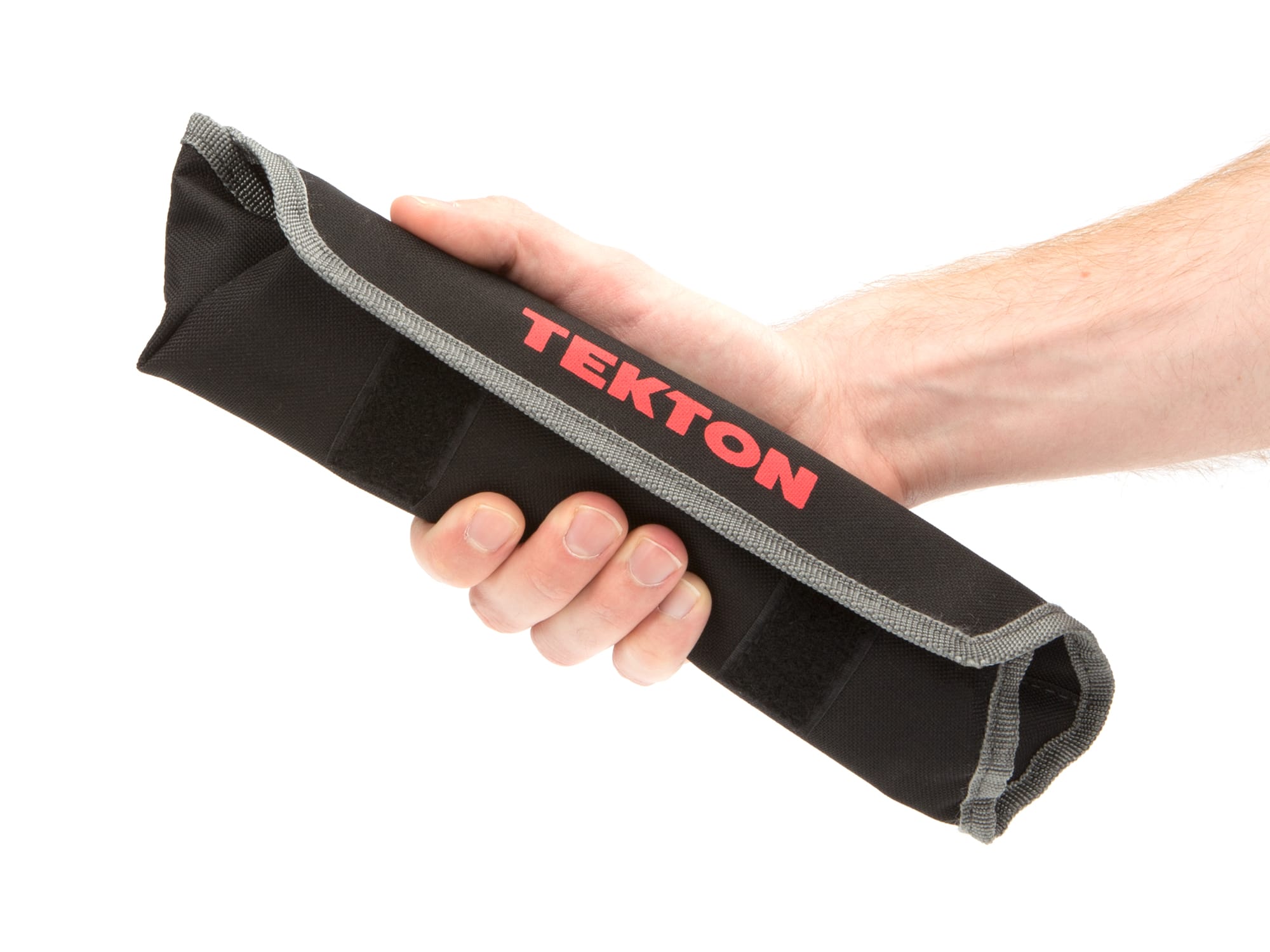 Person holding Tekton pouch box end wrench set. Item #WBE23505