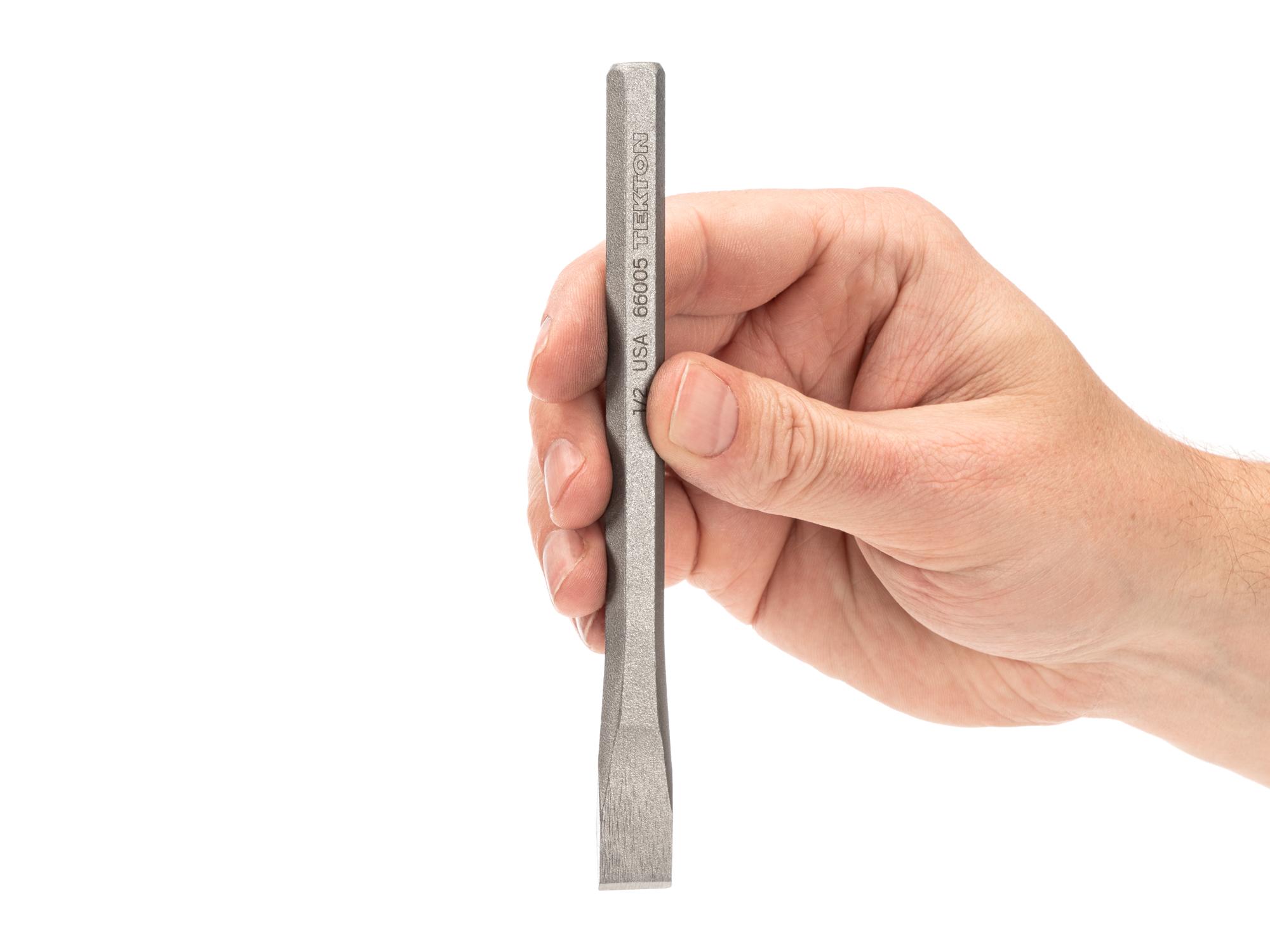 Person holding Tekton cold chisel. Item #66005