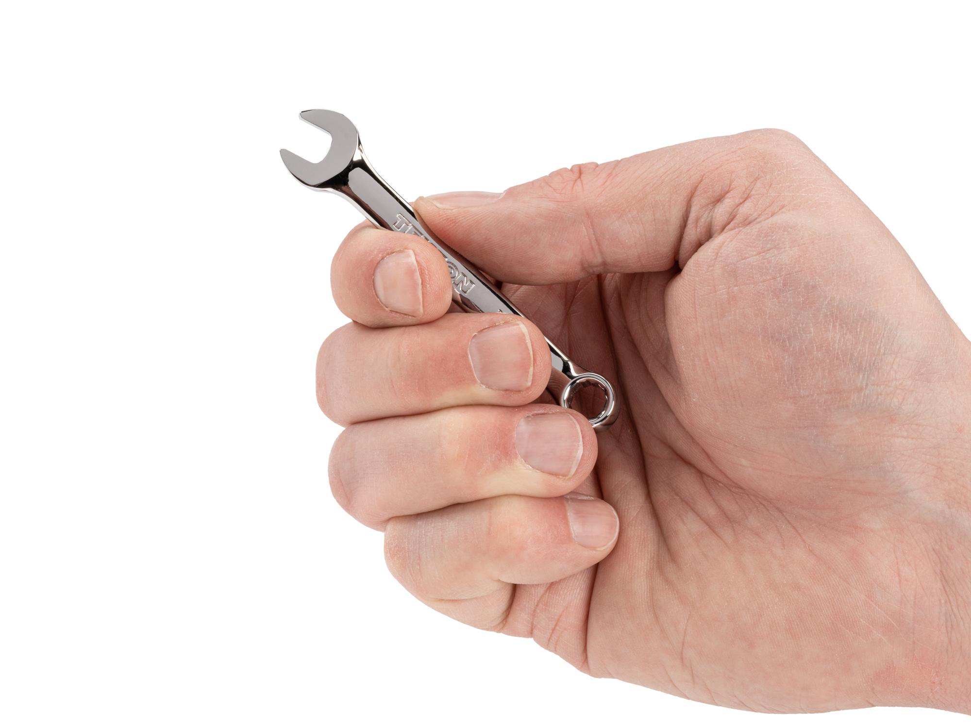 Person holding Tekton combination wrench. Item #18041