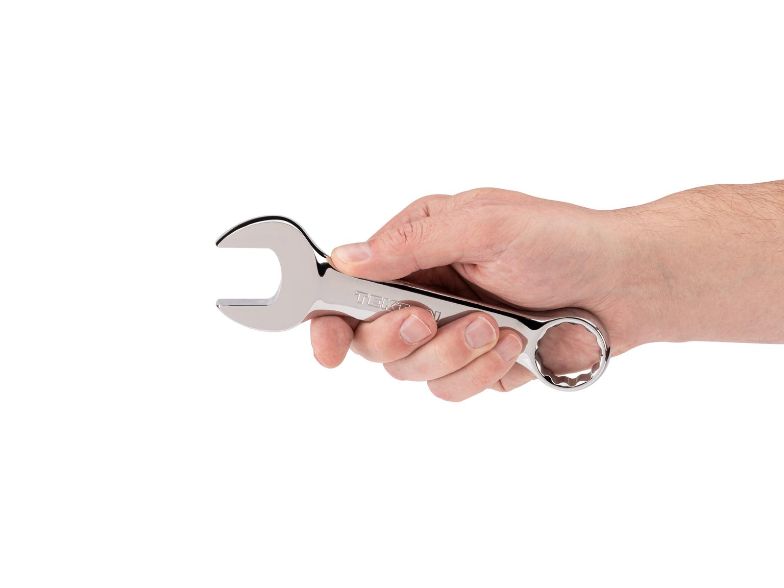 Person holding Tekton combination wrench. Item #18053