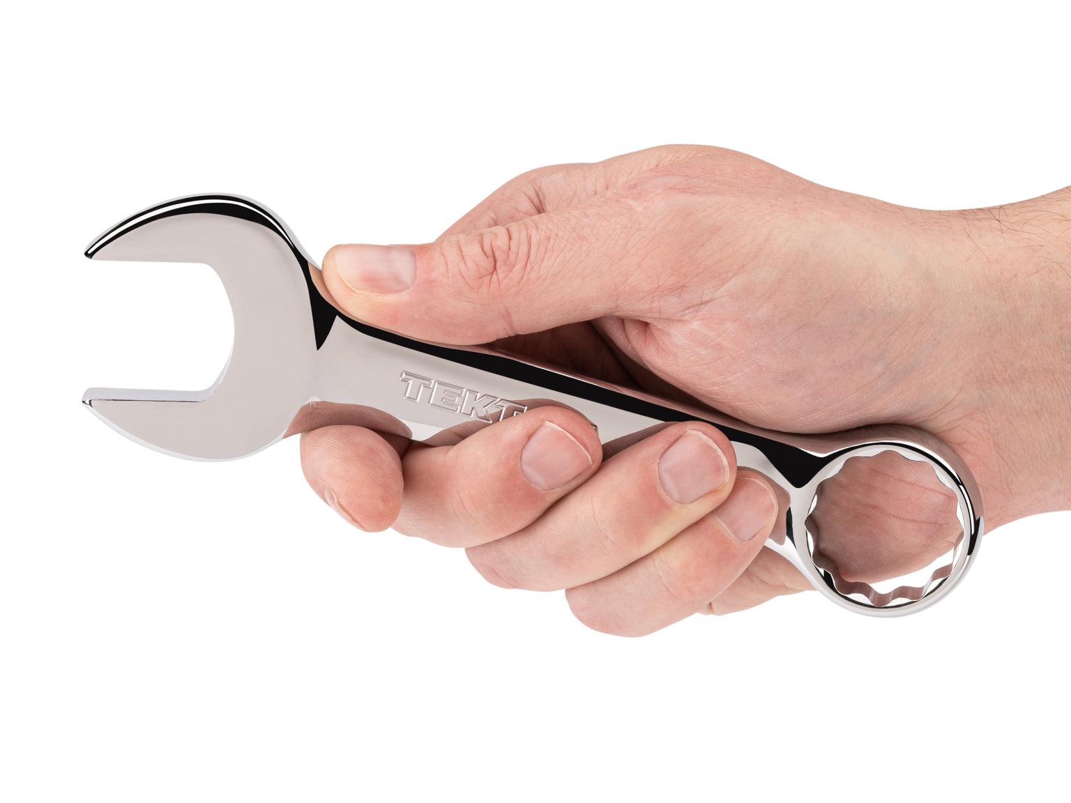Person holding Tekton combination wrench. Item #18054