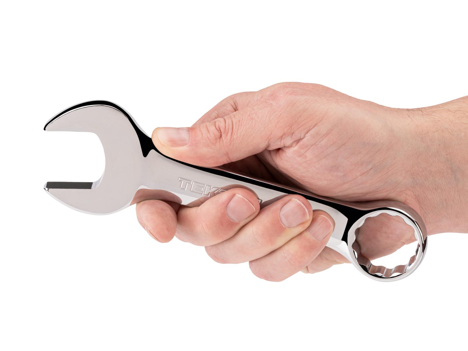 Person holding Tekton combination wrench. Item #18055