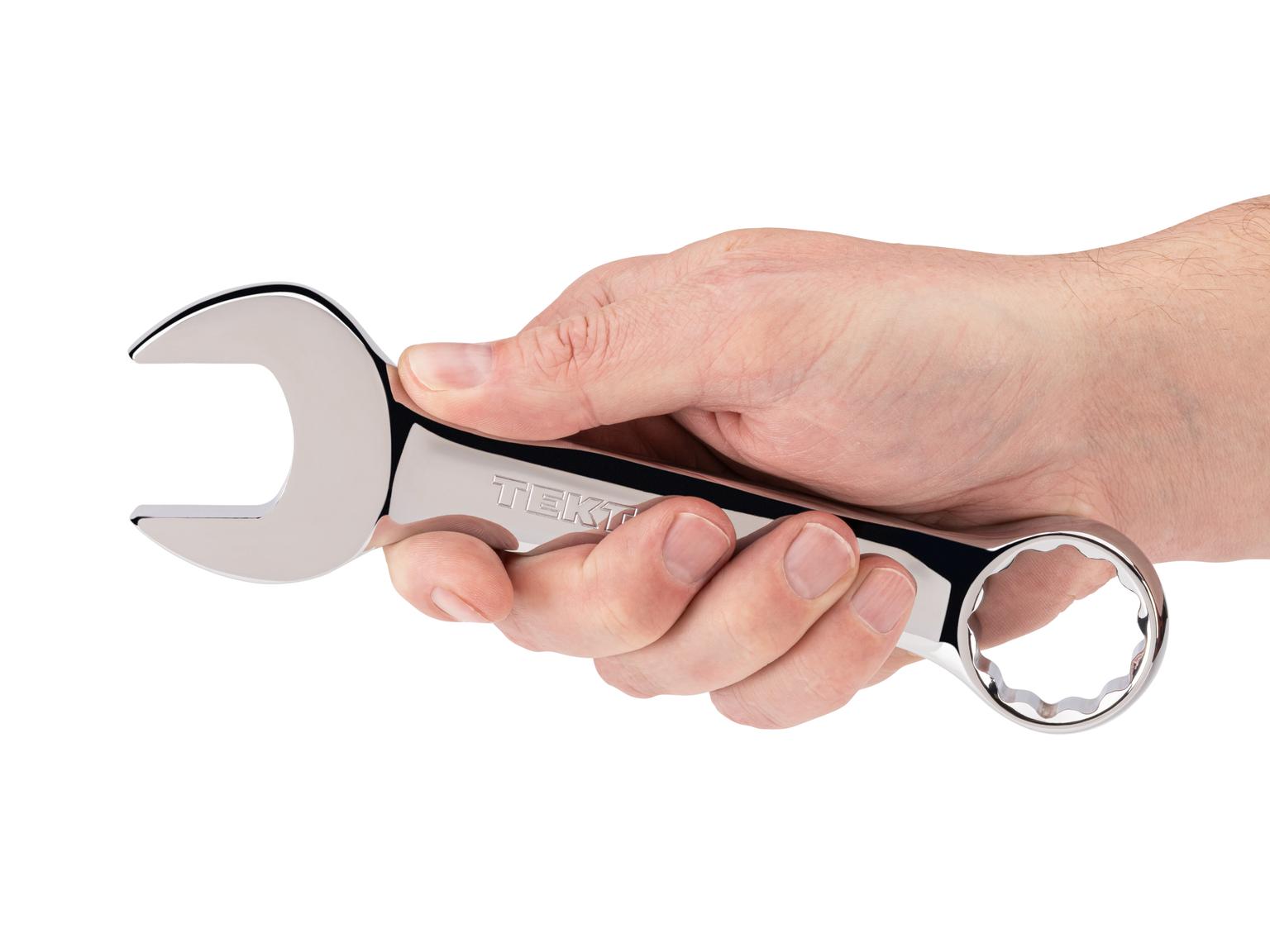 Person holding Tekton combination wrench. Item #18056
