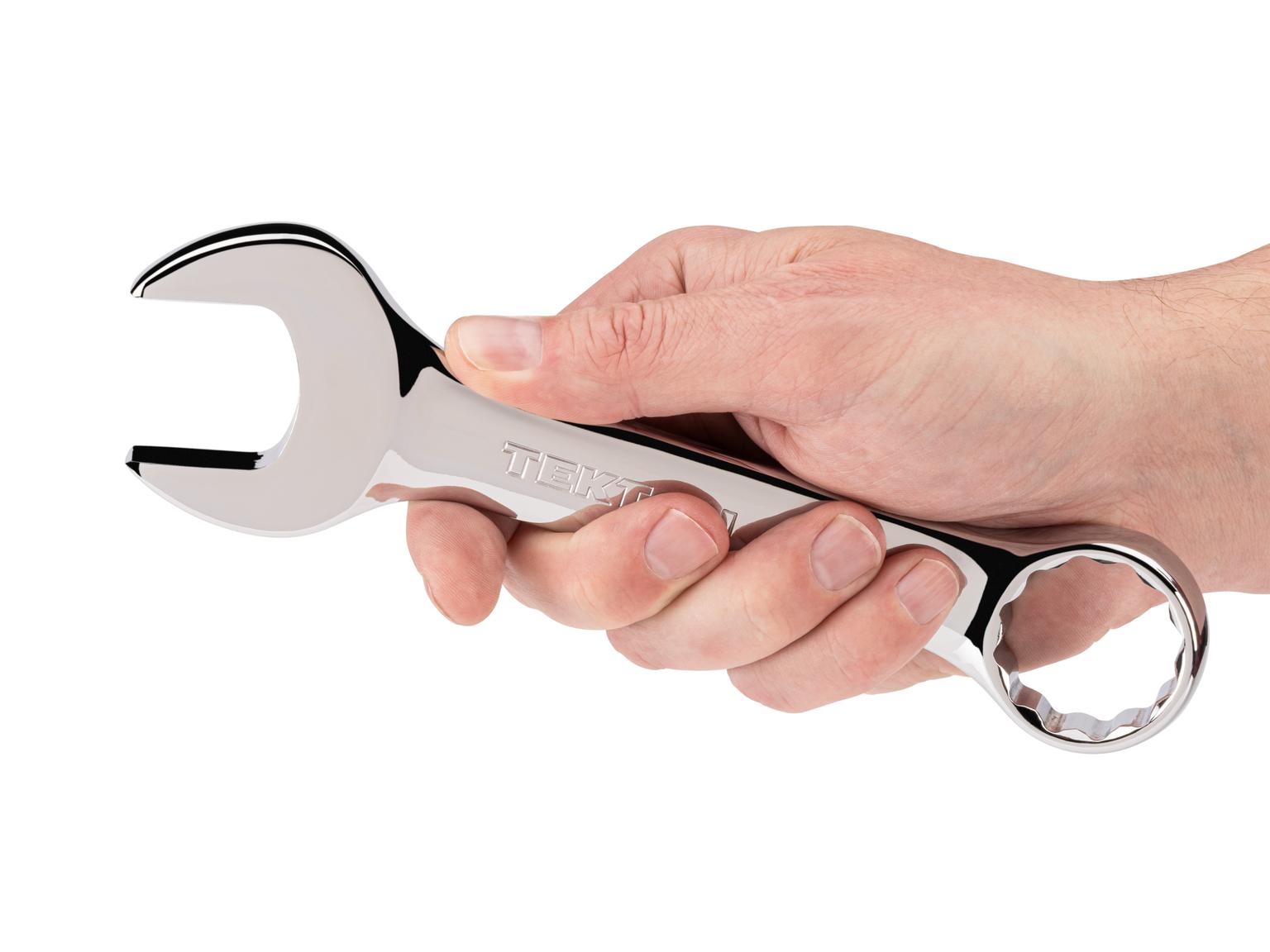 Person holding Tekton combination wrench. Item #18058